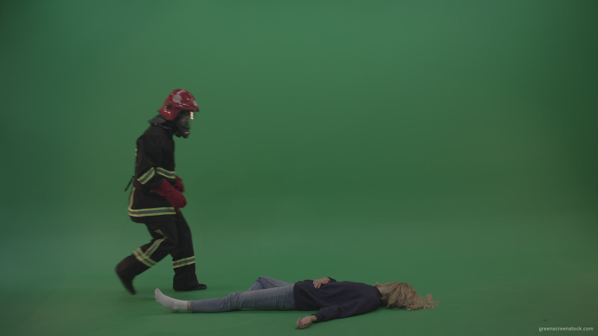 vj video background Brave_Fireman_Runs_To_Unconscious_Young_Victim_Girl_Slightly_Wakes_Her_Up_Takes_On_Strong_Hands_And_Carries_Towards_Safety_On_Green_Screen_Wall_Background_003