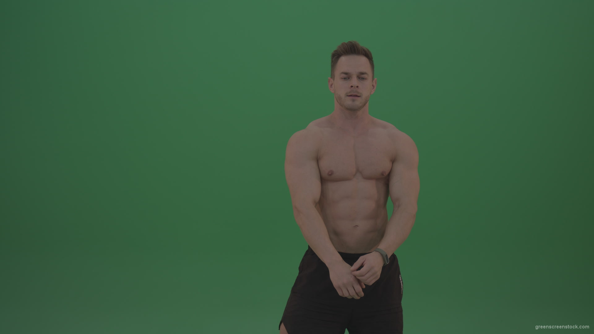 Green-Screen-Blone_Bodybuilder_Demonstrating_Front_Double_Biceps_And_Lateral_Spread_Positions_On_Green_Screen_Wall_Background_001 Green Screen Stock