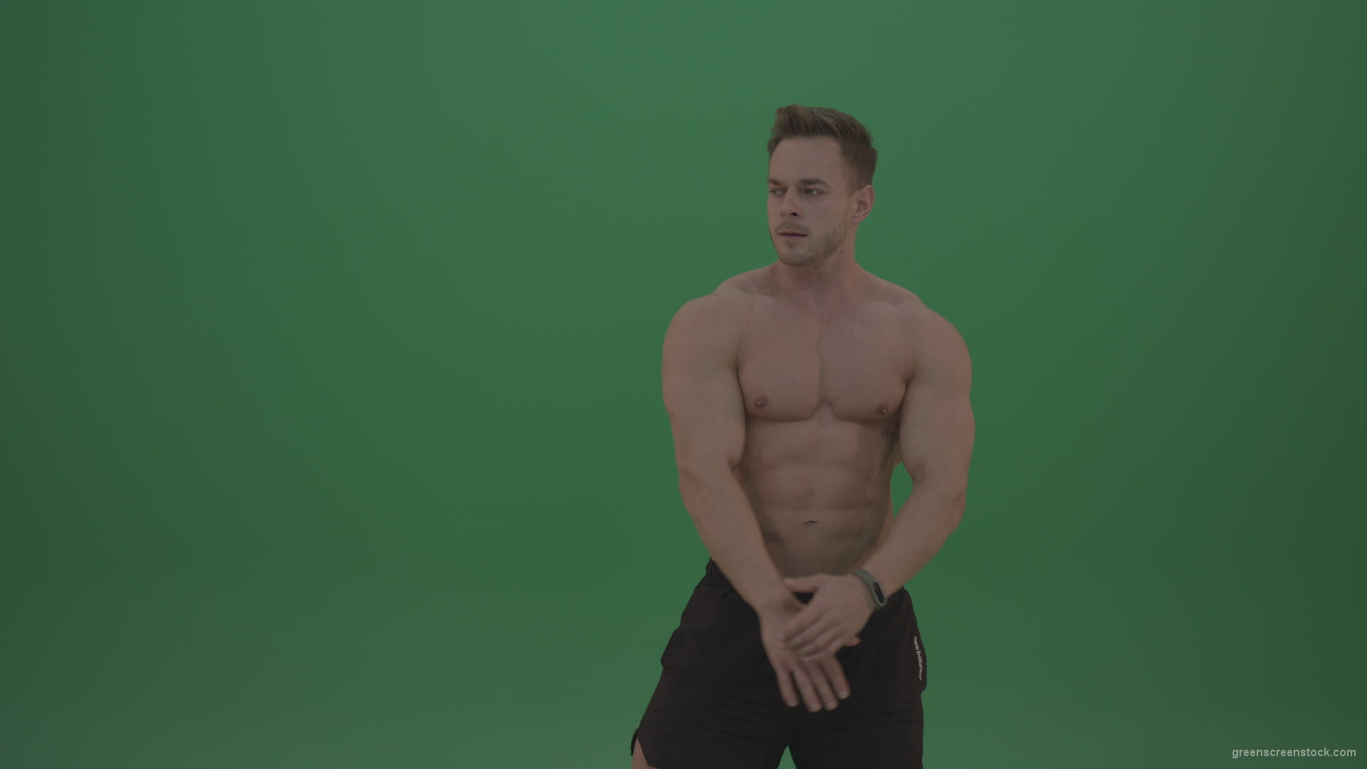 Green-Screen-Blone_Bodybuilder_Demonstrating_Front_Double_Biceps_And_Lateral_Spread_Positions_On_Green_Screen_Wall_Background_002 Green Screen Stock