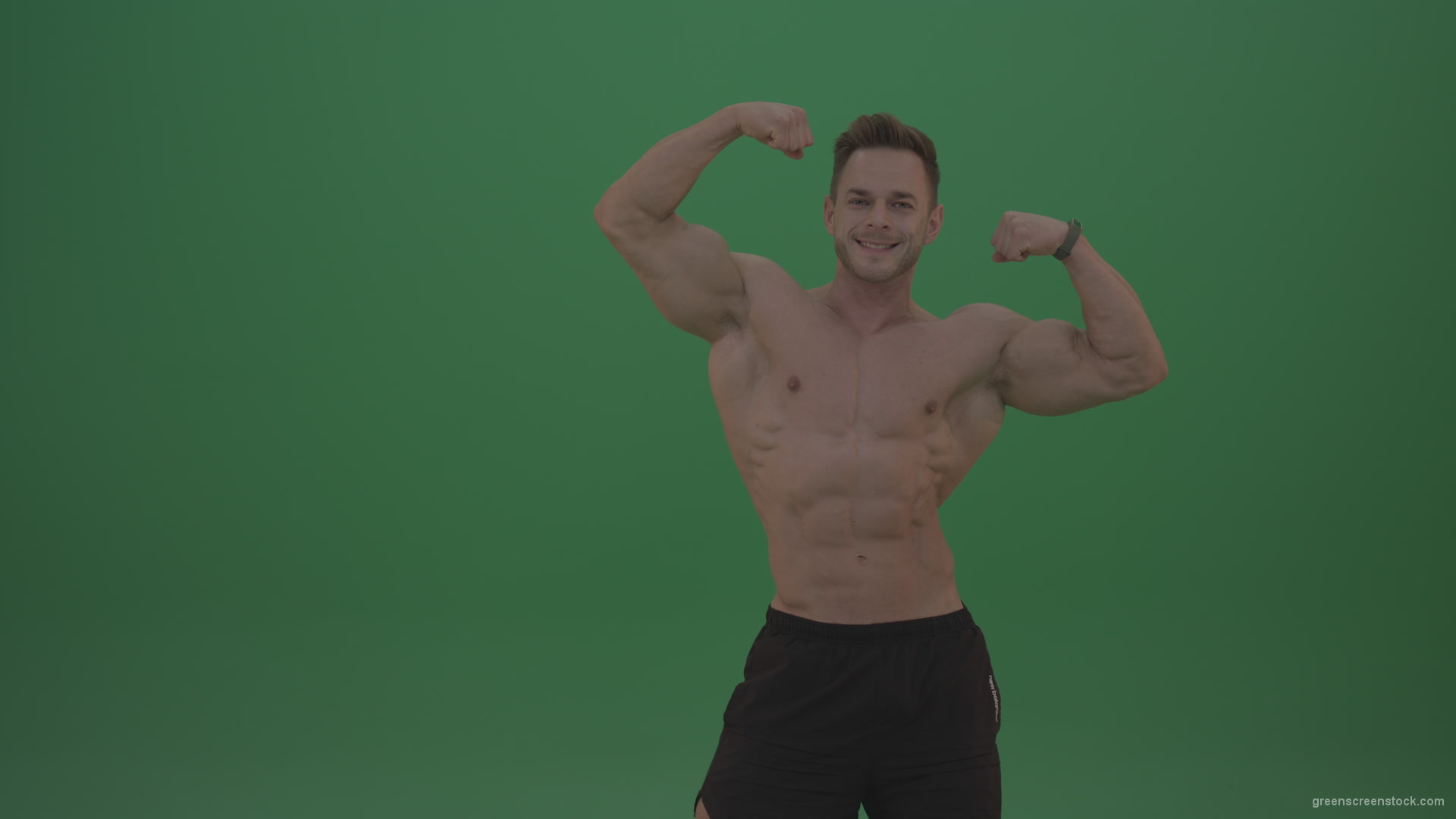 Green-Screen-Blone_Bodybuilder_Demonstrating_Front_Double_Biceps_And_Lateral_Spread_Positions_On_Green_Screen_Wall_Background_004 Green Screen Stock