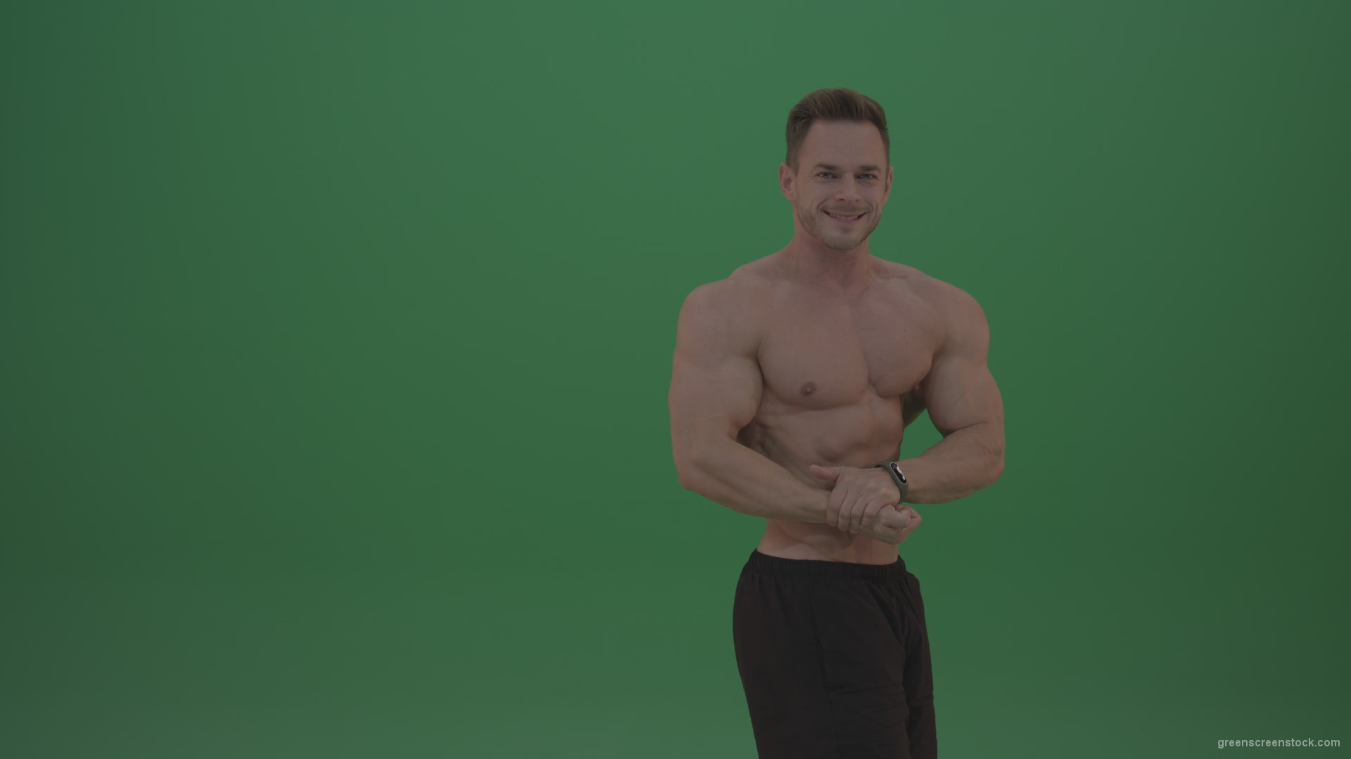 Green-Screen-Blone_Bodybuilder_Demonstrating_Front_Double_Biceps_And_Lateral_Spread_Positions_On_Green_Screen_Wall_Background_009 Green Screen Stock