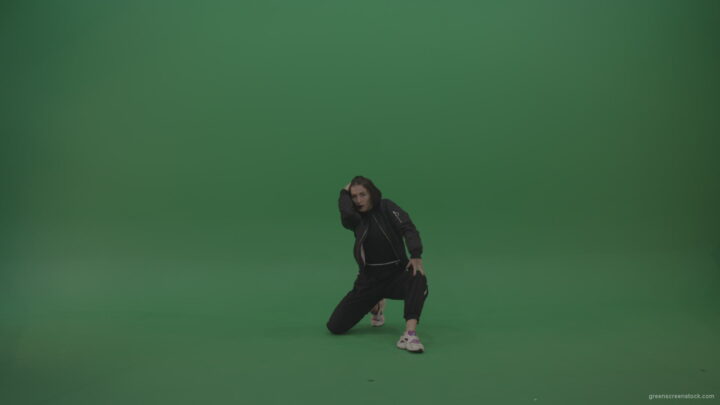 Incredible_Dance_Hip_Hop_Moves_From_Young_Brunette_Female_Wearing_Black_Sweat_Suite_And_White_Trainers_On_Green_Screen_Wall_Background_009 Green Screen Stock