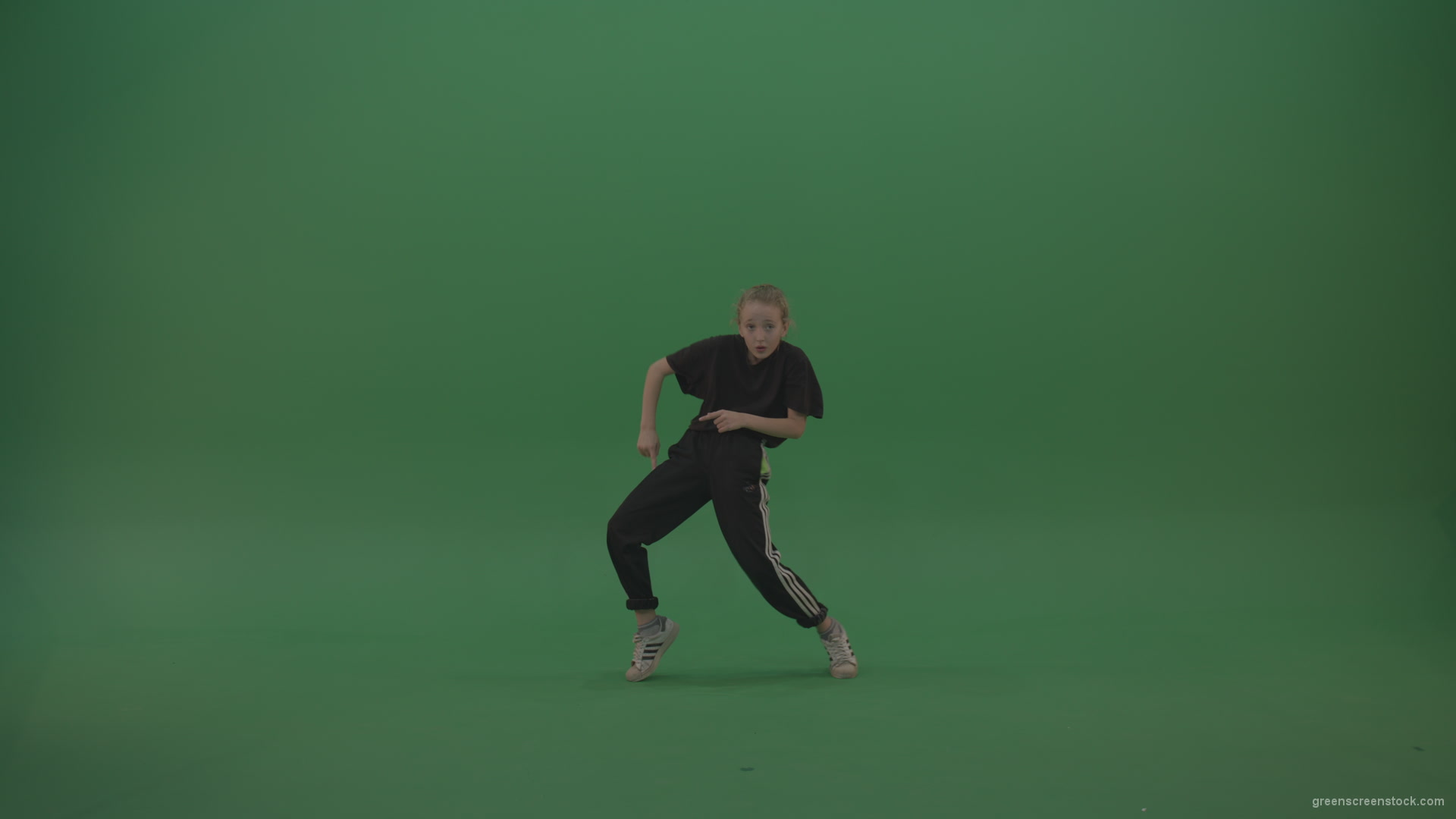 vj video background Incredible_Dance_Hip_Hop_Moves_From_Young_SmalKid_Female_Wearing_Black_Sweat_Suite_And_White_Trainers_On_Green_Screen_Wall_Background_003