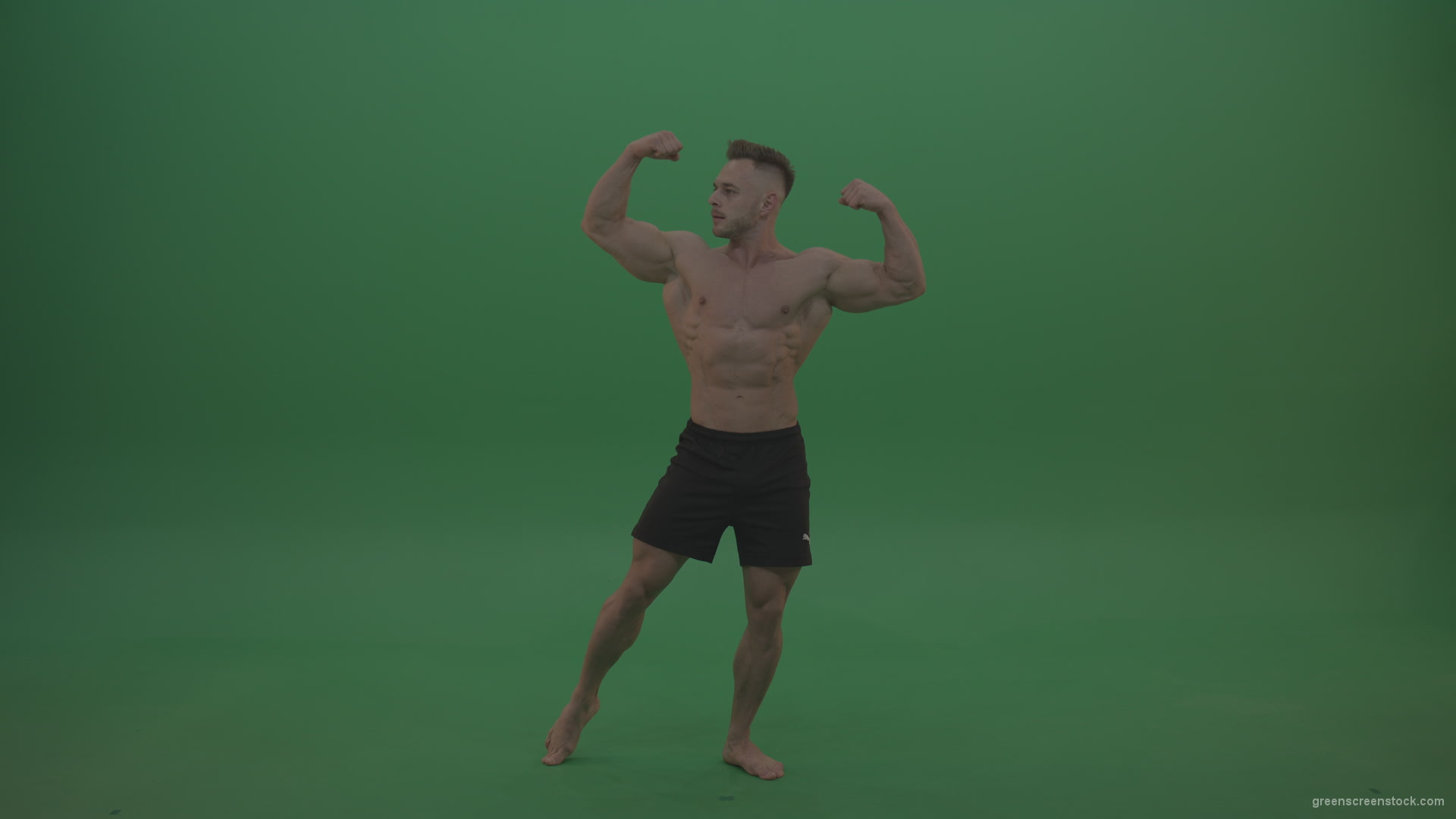 Young_Blonde_Bodybuilder_Demnstrating_Great_Double_Biceps_And_Front_Lateral_Spread_Posing_Technique_Green_Screen_Wall_Background_004 Green Screen Stock