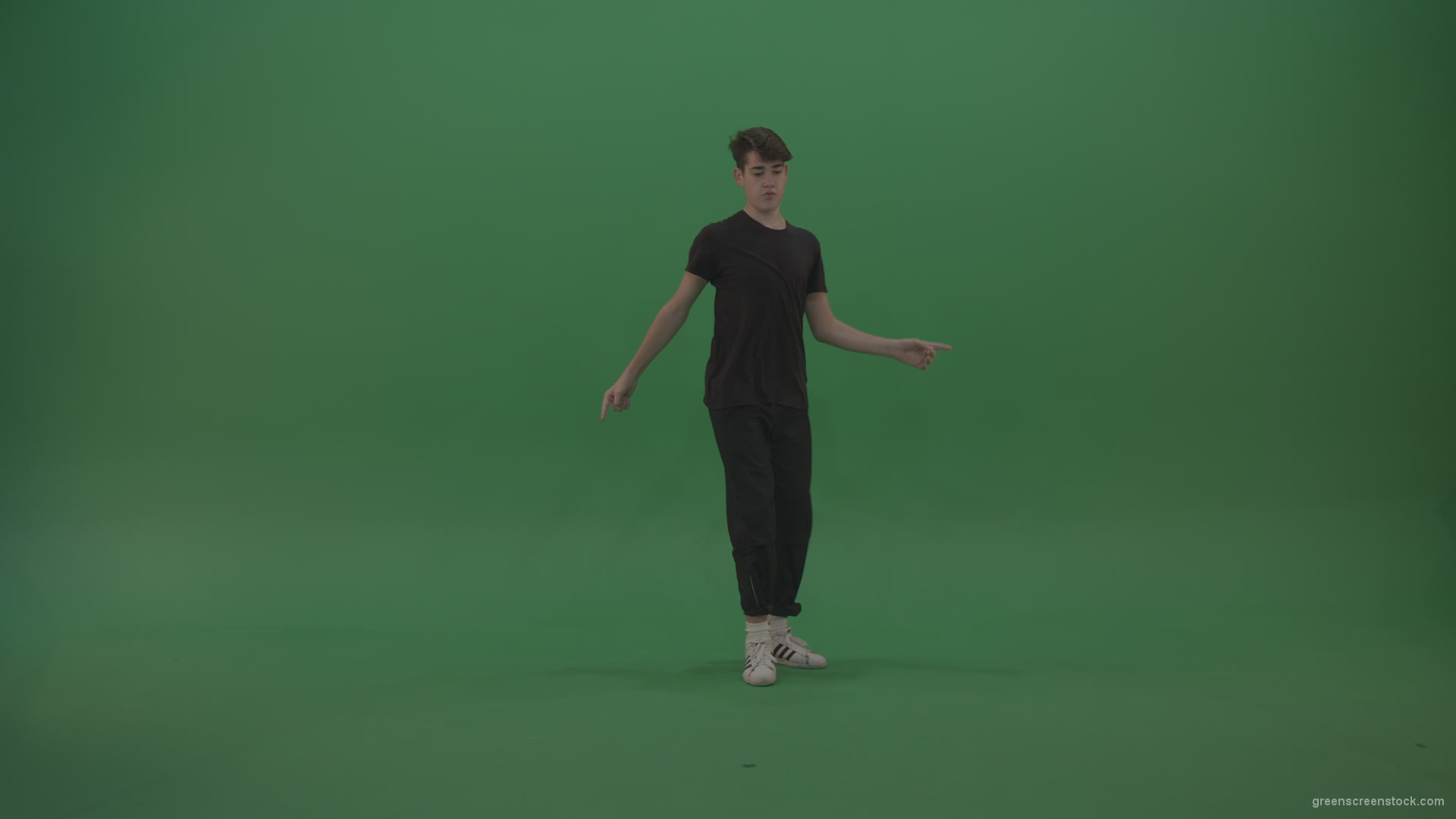 Young_Brunette_Boy_Showing_Awesome_Hip_Hop_Dance_Technical_Skills_With_Robot_Tought_Moves_On_Green_Screen_Chroma_Key_Background_001 Green Screen Stock