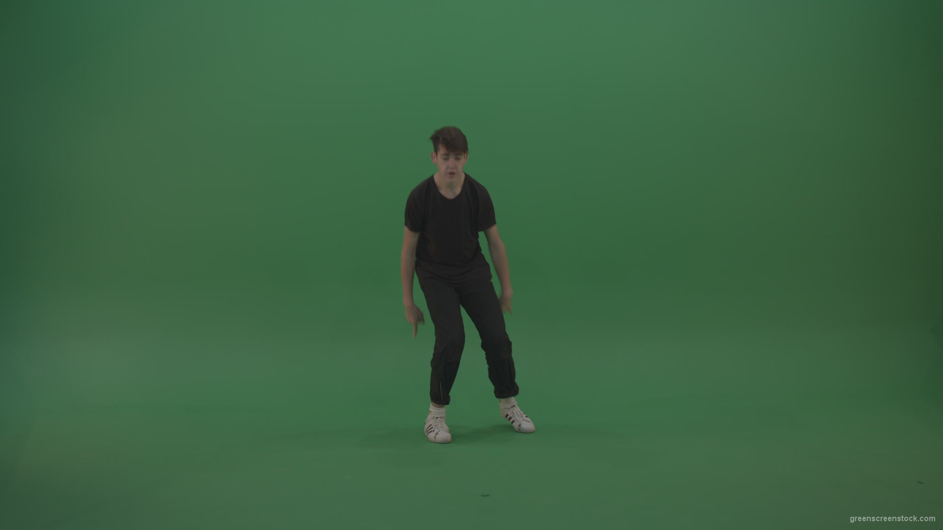 Young_Brunette_Boy_Showing_Awesome_Hip_Hop_Dance_Technical_Skills_With_Robot_Tought_Moves_On_Green_Screen_Chroma_Key_Background_002 Green Screen Stock