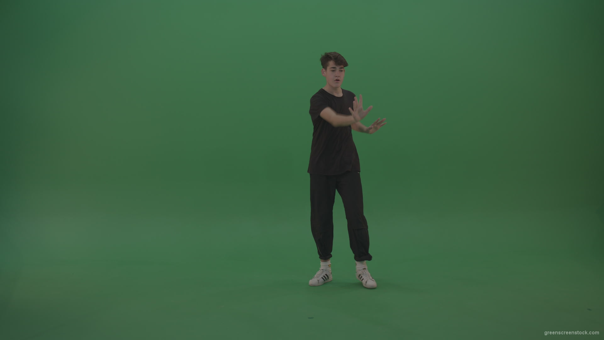 Young_Brunette_Boy_Showing_Awesome_Hip_Hop_Dance_Technical_Skills_With_Robot_Tought_Moves_On_Green_Screen_Chroma_Key_Background_004 Green Screen Stock