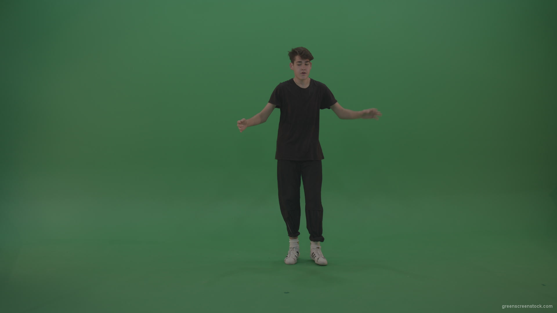 Young_Brunette_Boy_Showing_Awesome_Hip_Hop_Dance_Technical_Skills_With_Robot_Tought_Moves_On_Green_Screen_Chroma_Key_Background_007 Green Screen Stock