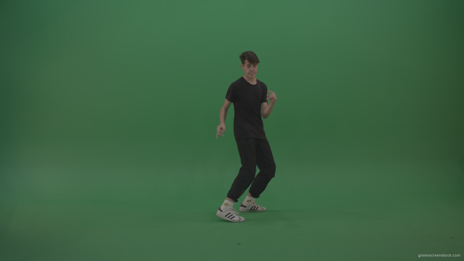 Young_Brunette_Boy_Showing_Awesome_Hip_Hop_Dance_Technical_Skills_With_Robot_Tought_Moves_On_Green_Screen_Chroma_Key_Background_008 Green Screen Stock