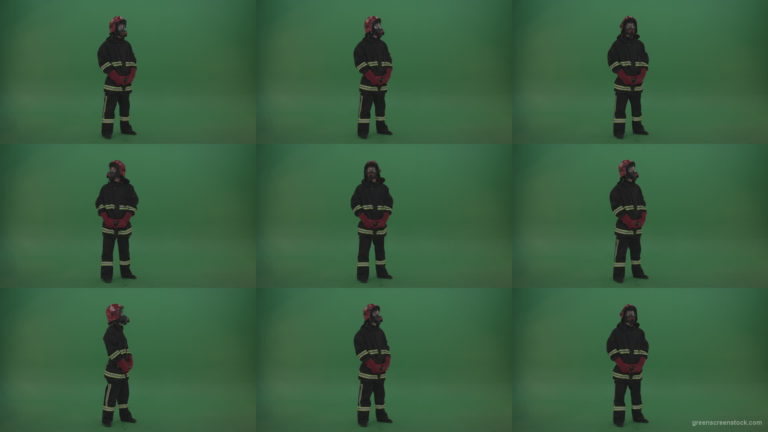 Young_Firefighter_Wearing_Full_FIreman_Working_Kit_Looking_Around_To_Fing_Some_Fire_Arson_Problems_On_Green_Screen_Wall_Background Green Screen Stock