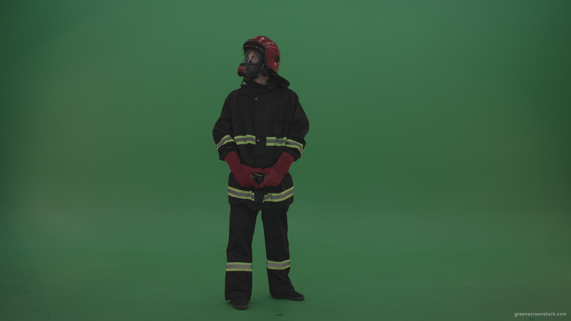 Young_Firefighter_Wearing_Full_FIreman_Working_Kit_Looking_Around_To_Fing_Some_Fire_Arson_Problems_On_Green_Screen_Wall_Background_004 Green Screen Stock