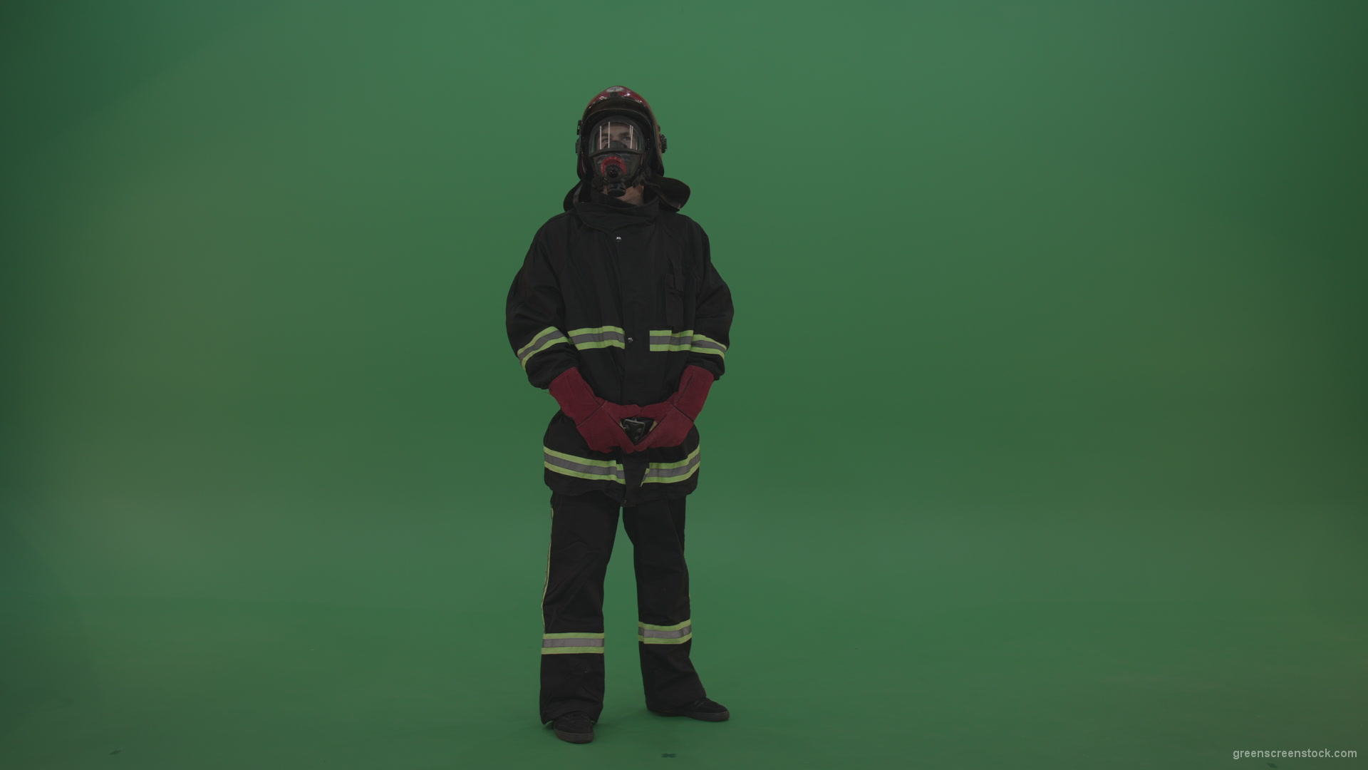 Young_Firefighter_Wearing_Full_FIreman_Working_Kit_Looking_Around_To_Fing_Some_Fire_Arson_Problems_On_Green_Screen_Wall_Background_005 Green Screen Stock