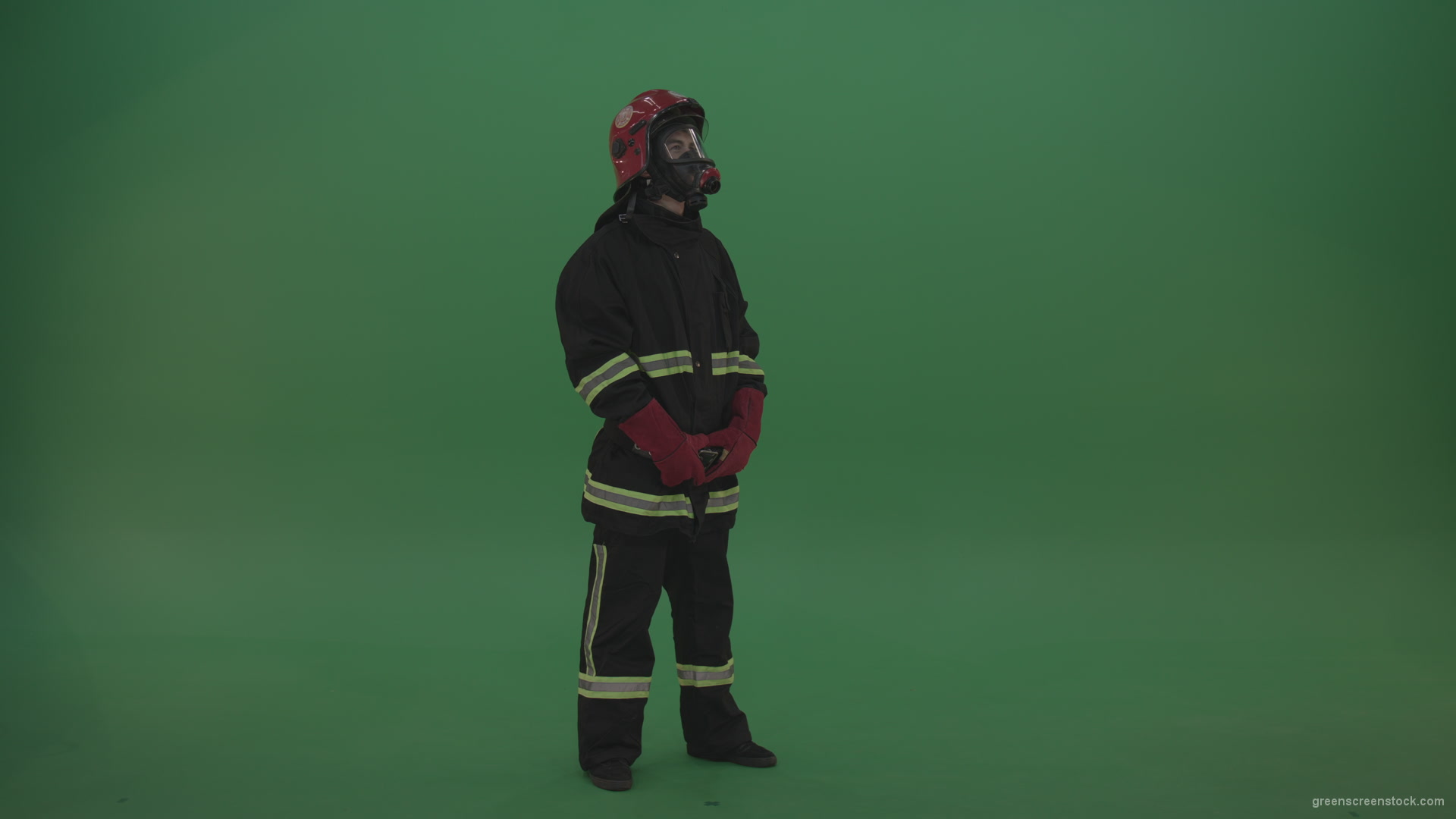 Young_Firefighter_Wearing_Full_FIreman_Working_Kit_Looking_Around_To_Fing_Some_Fire_Arson_Problems_On_Green_Screen_Wall_Background_008 Green Screen Stock