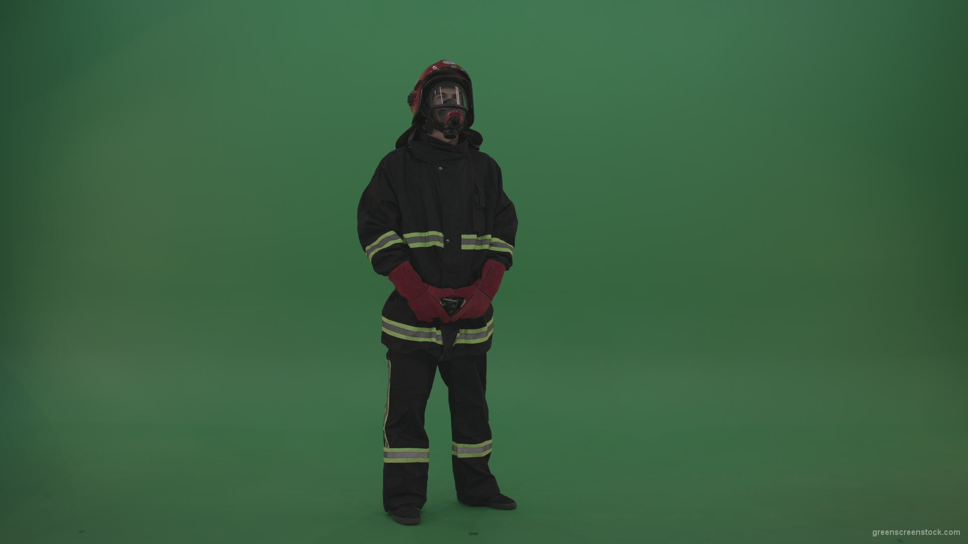 Young_Firefighter_Wearing_Full_FIreman_Working_Kit_Looking_Around_To_Fing_Some_Fire_Arson_Problems_On_Green_Screen_Wall_Background_009 Green Screen Stock