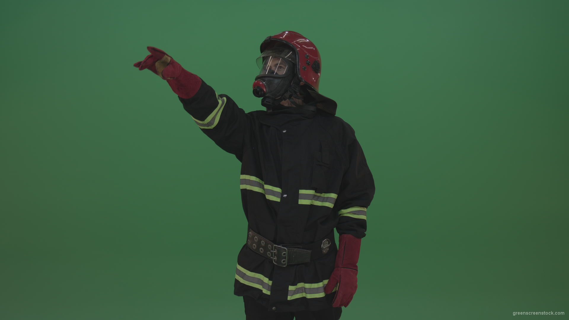 Young_Fireman_Points_Left_And_Right_At_Something_He_Noticed_On_Green_Screen_Chroma_Key_Wall_Background_006 Green Screen Stock