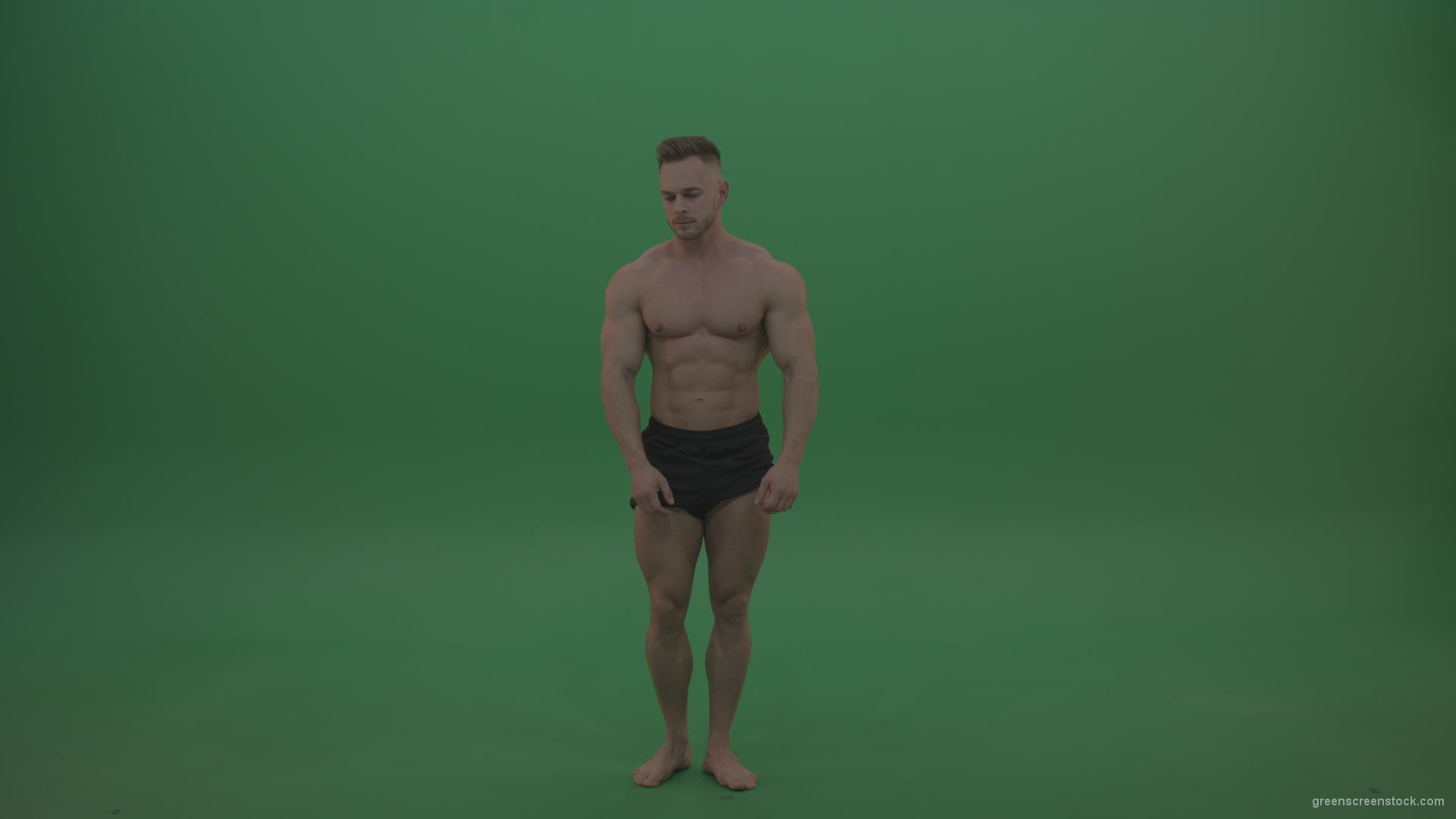 Young_Sportsman_Showing_Front_Double_Biceps_And_Thigh_Muscles_Bodybuilding_Positions_On_Gren_Screen_Wall_Background_001 Green Screen Stock