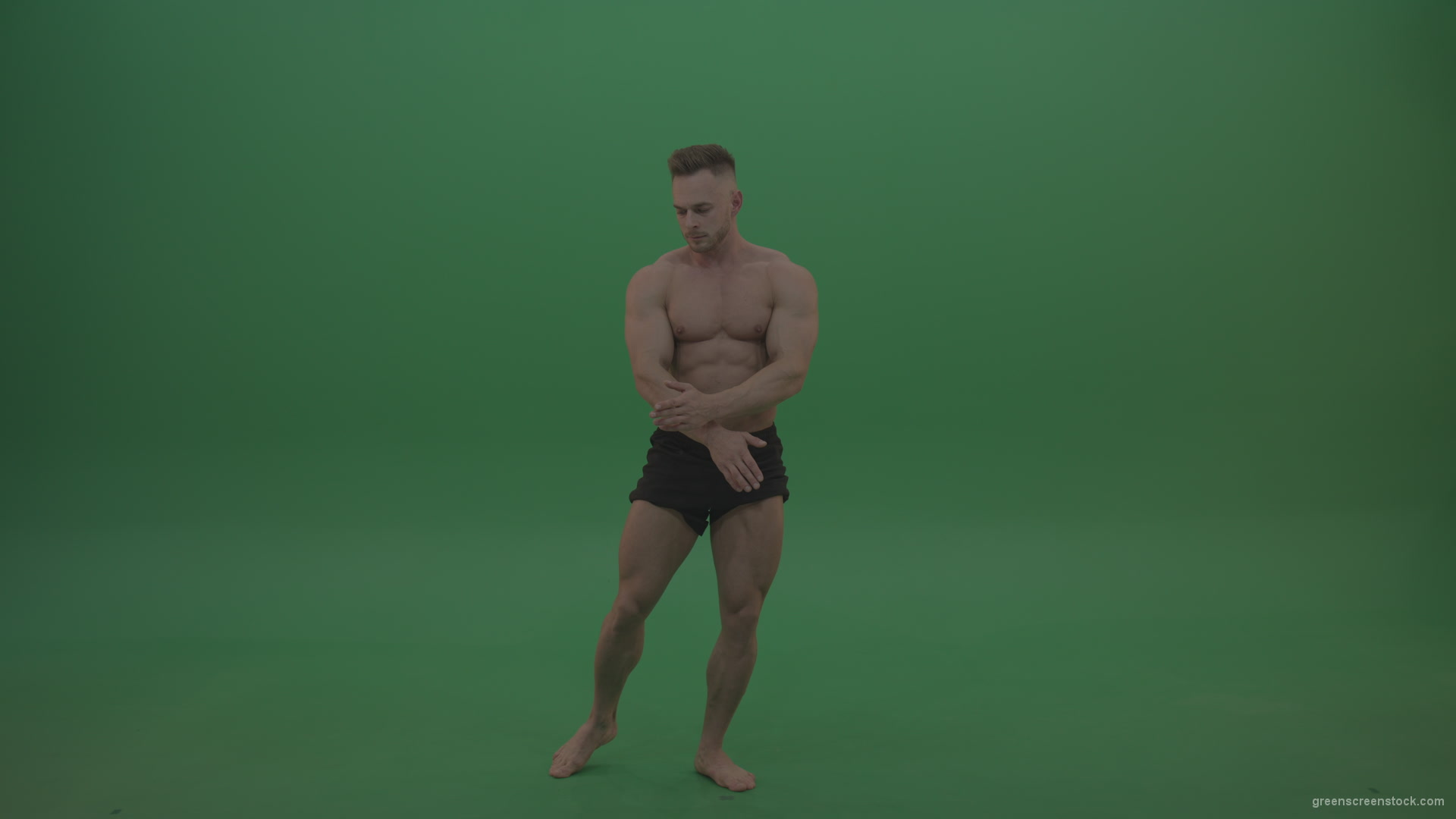Young_Sportsman_Showing_Front_Double_Biceps_And_Thigh_Muscles_Bodybuilding_Positions_On_Gren_Screen_Wall_Background_002 Green Screen Stock