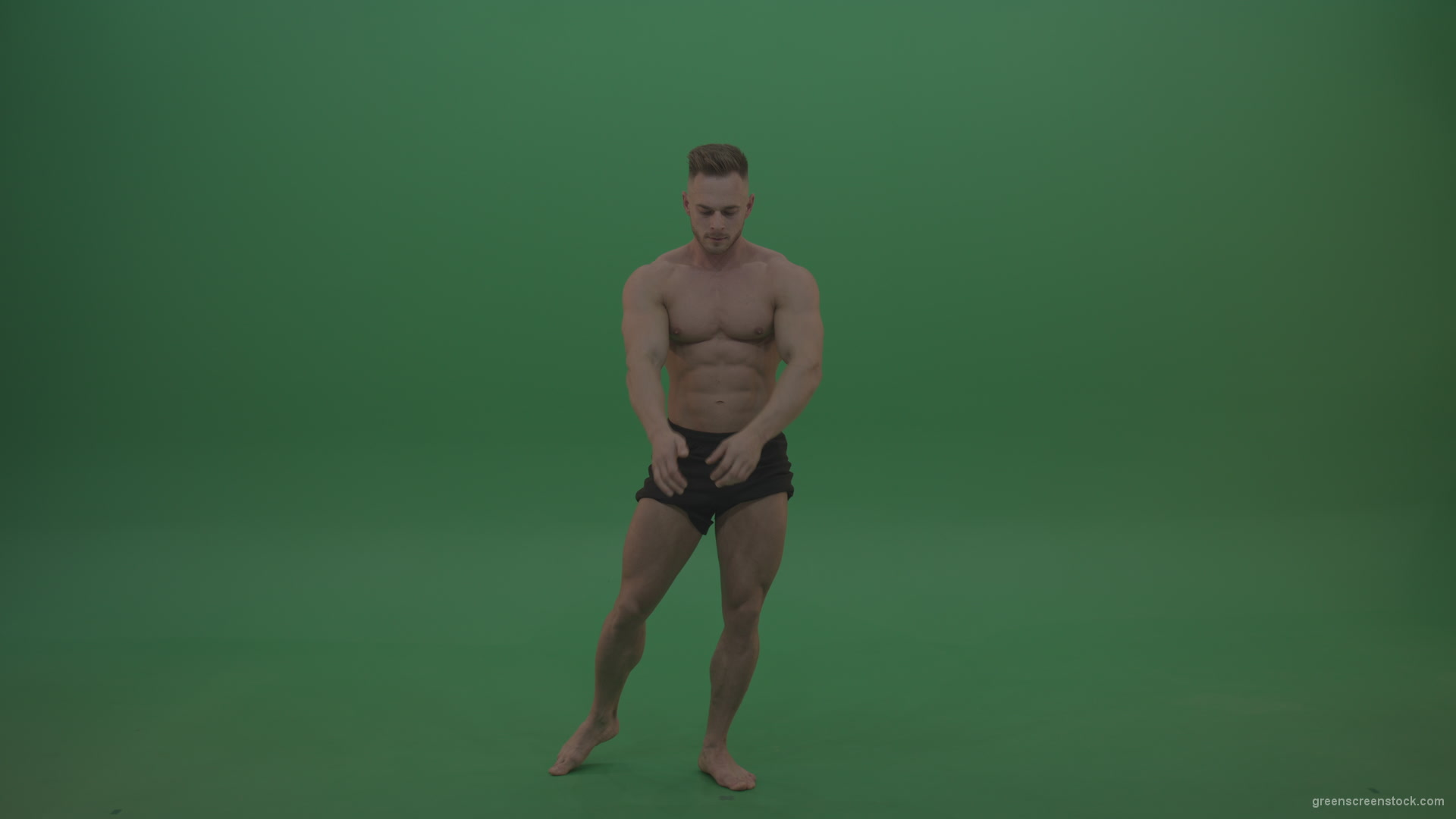 Young_Sportsman_Showing_Front_Double_Biceps_And_Thigh_Muscles_Bodybuilding_Positions_On_Gren_Screen_Wall_Background_005 Green Screen Stock