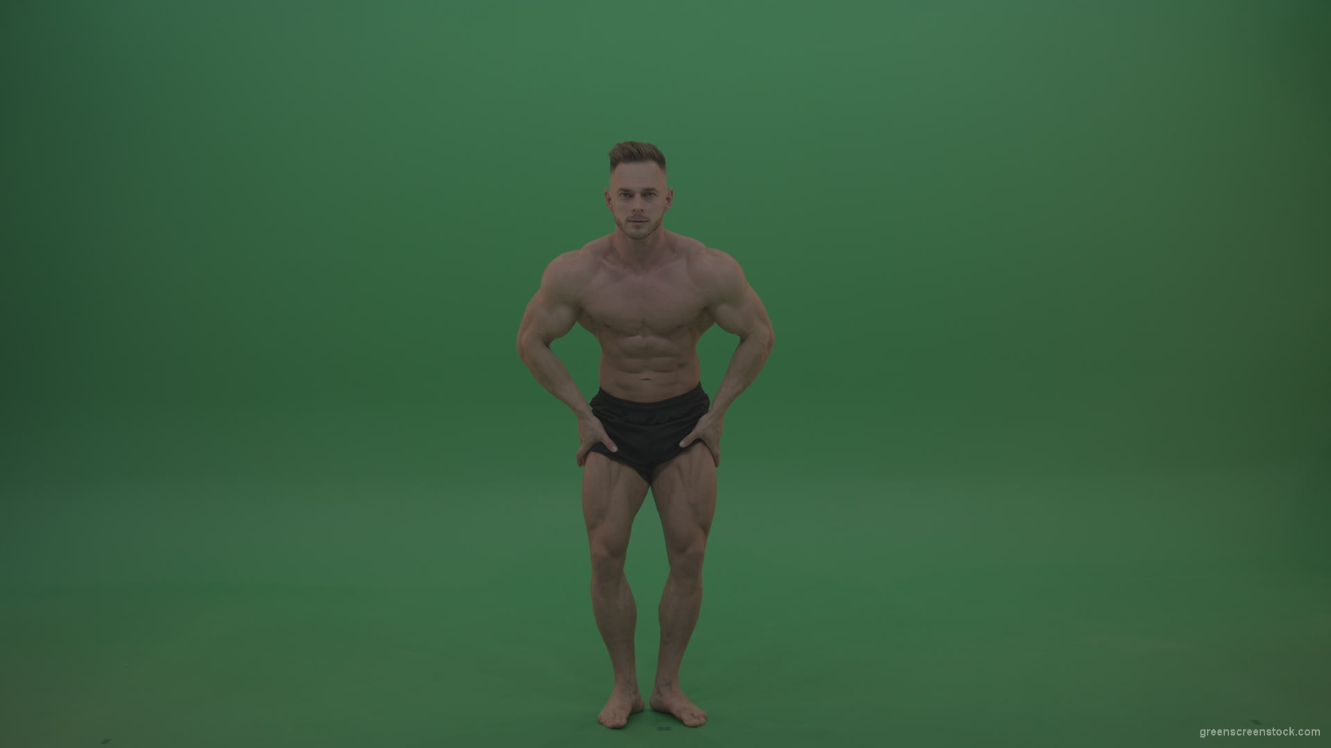 Young_Sportsman_Showing_Front_Double_Biceps_And_Thigh_Muscles_Bodybuilding_Positions_On_Gren_Screen_Wall_Background_006 Green Screen Stock