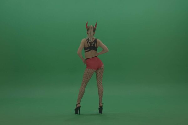 Dancing girl in mask with horns on green screen video footage