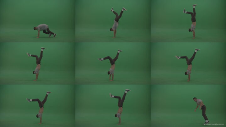 Man-dancing-and-staying-on-hand-on-the-green-floor-green-screen Green Screen Stock