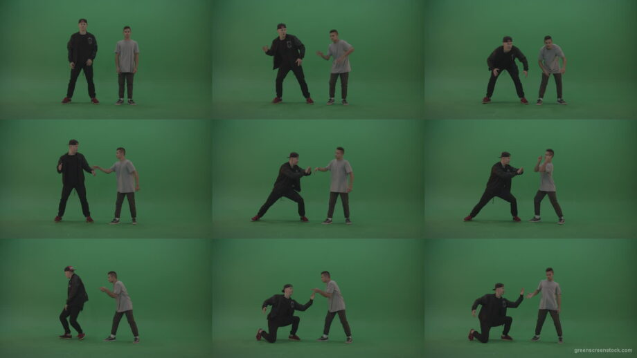 Robotic-moves-break-dancing-2-boys-over-green-background Green Screen Stock