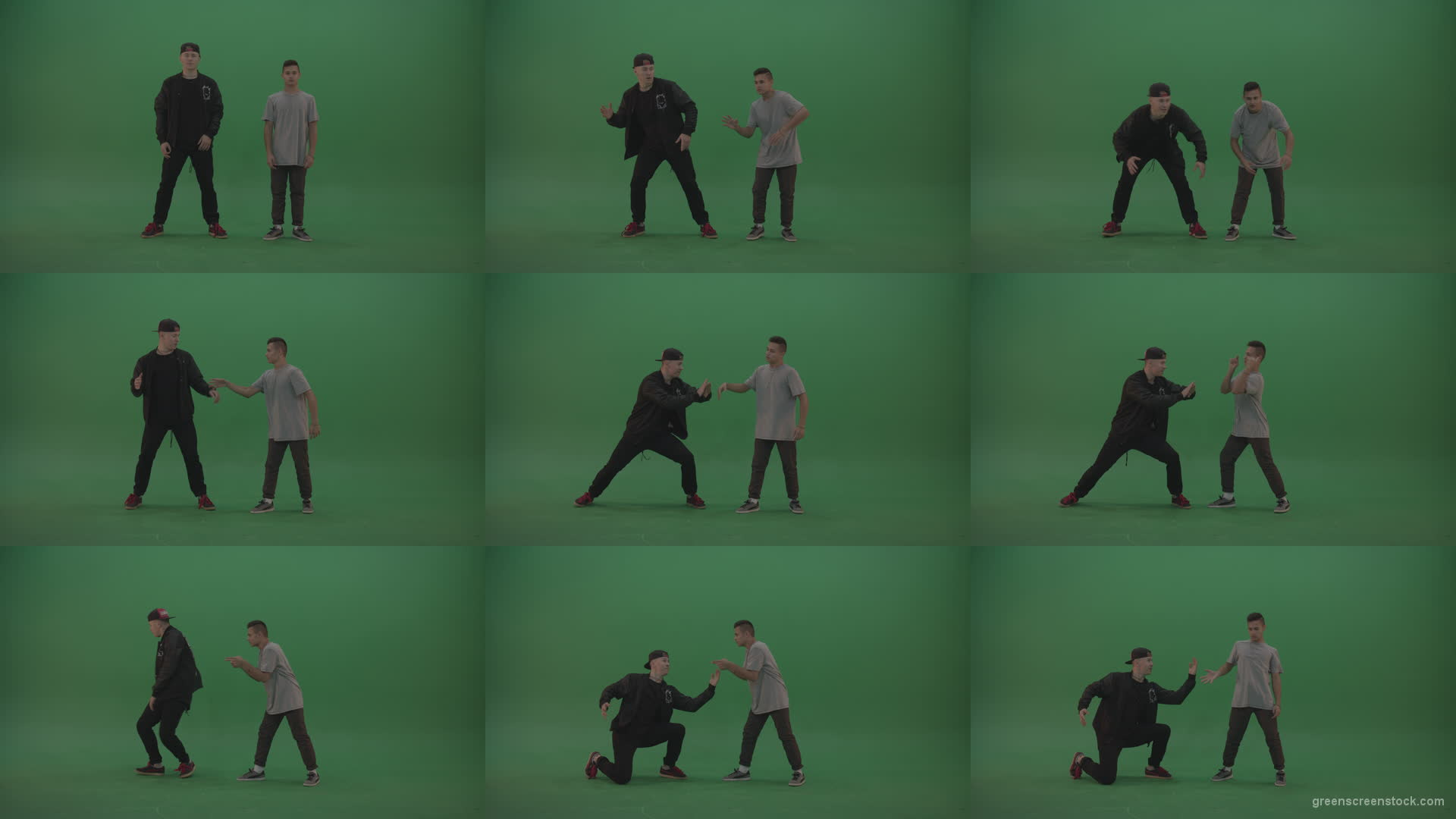 Robotic-moves-break-dancing-2-boys-over-green-background Green Screen Stock