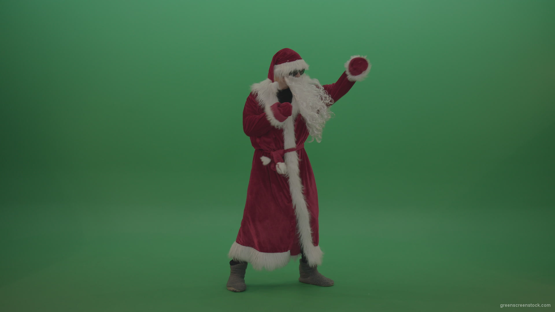 vj video background Santa-in-black-glasses-show-cases-his-boxing-skills-over-chromakey-background_003