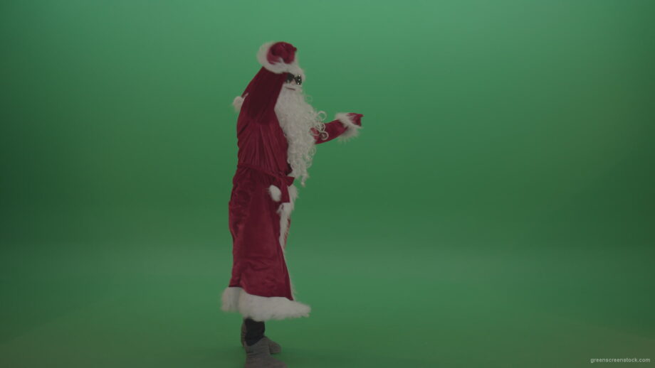 vj video background Santa-in-black-glasses-shows-his-dance-skills-over-chromakey-background_003