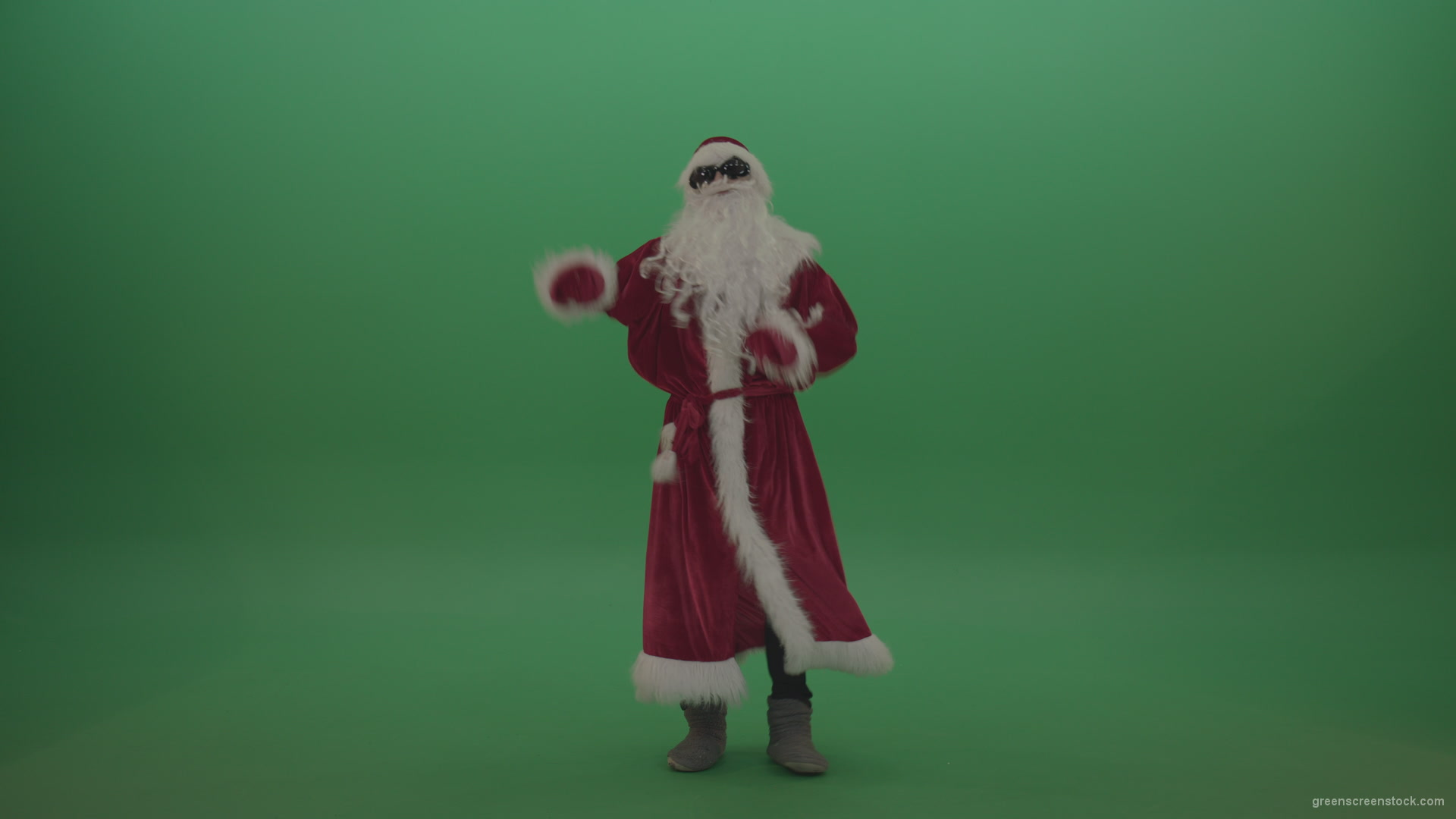 Santa-in-black-glasses-shows-his-dance-skills-over-chromakey-background_006 Green Screen Stock