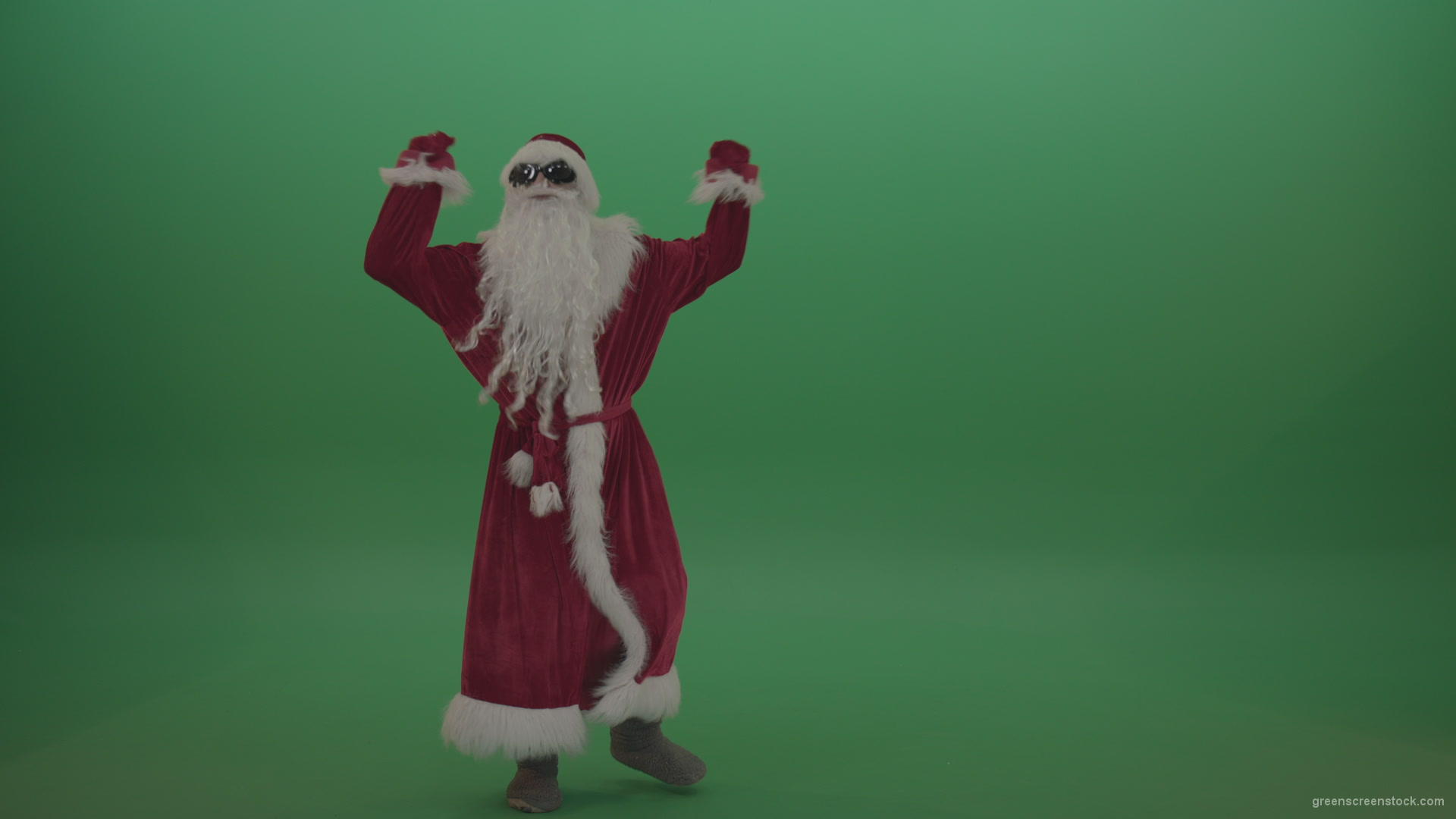 Santa-in-black-glasses-shows-his-dance-skills-over-chromakey-background_008 Green Screen Stock