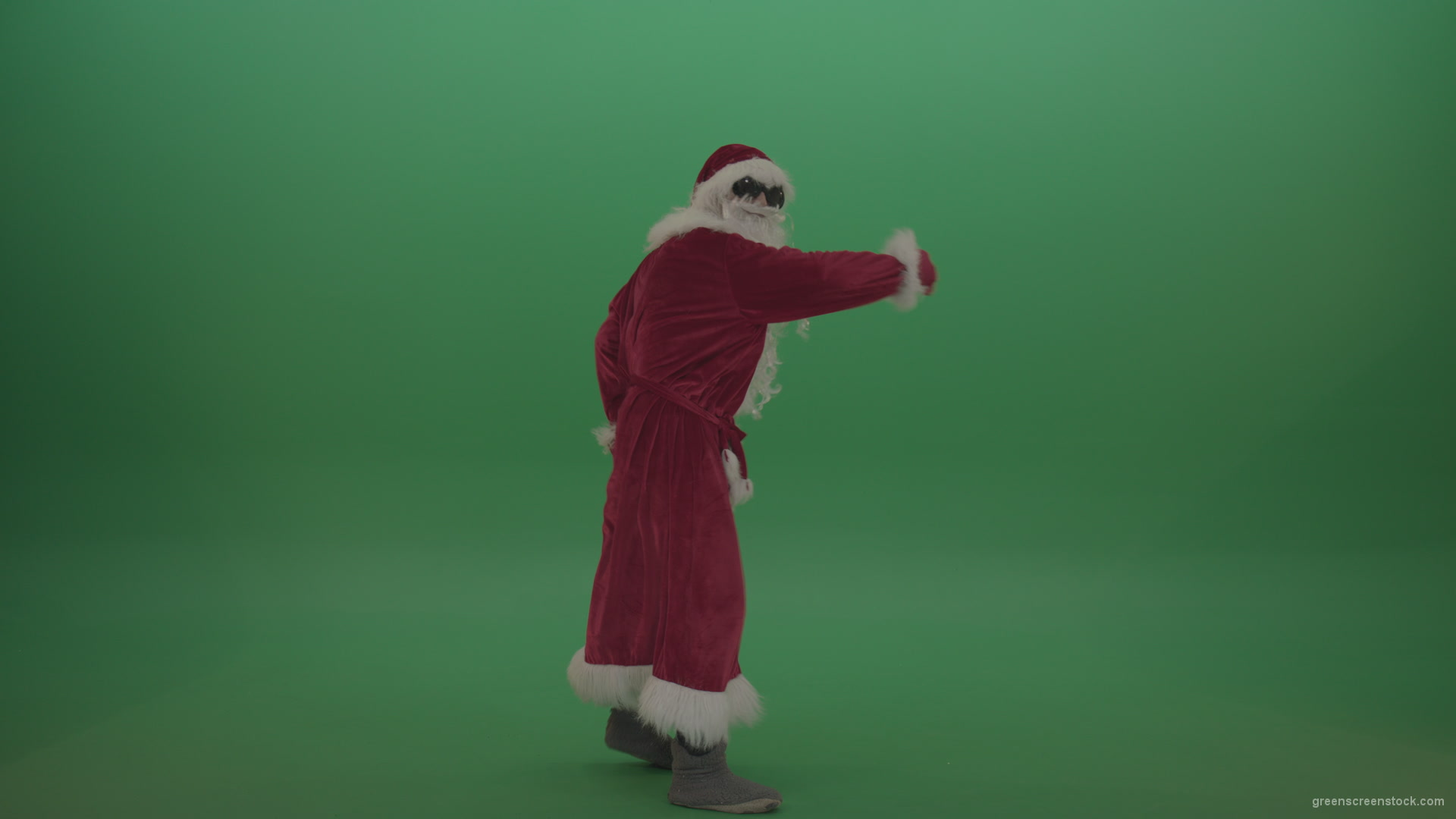 Santa-in-black-glasses-shows-his-dance-skills-over-chromakey-background_009 Green Screen Stock