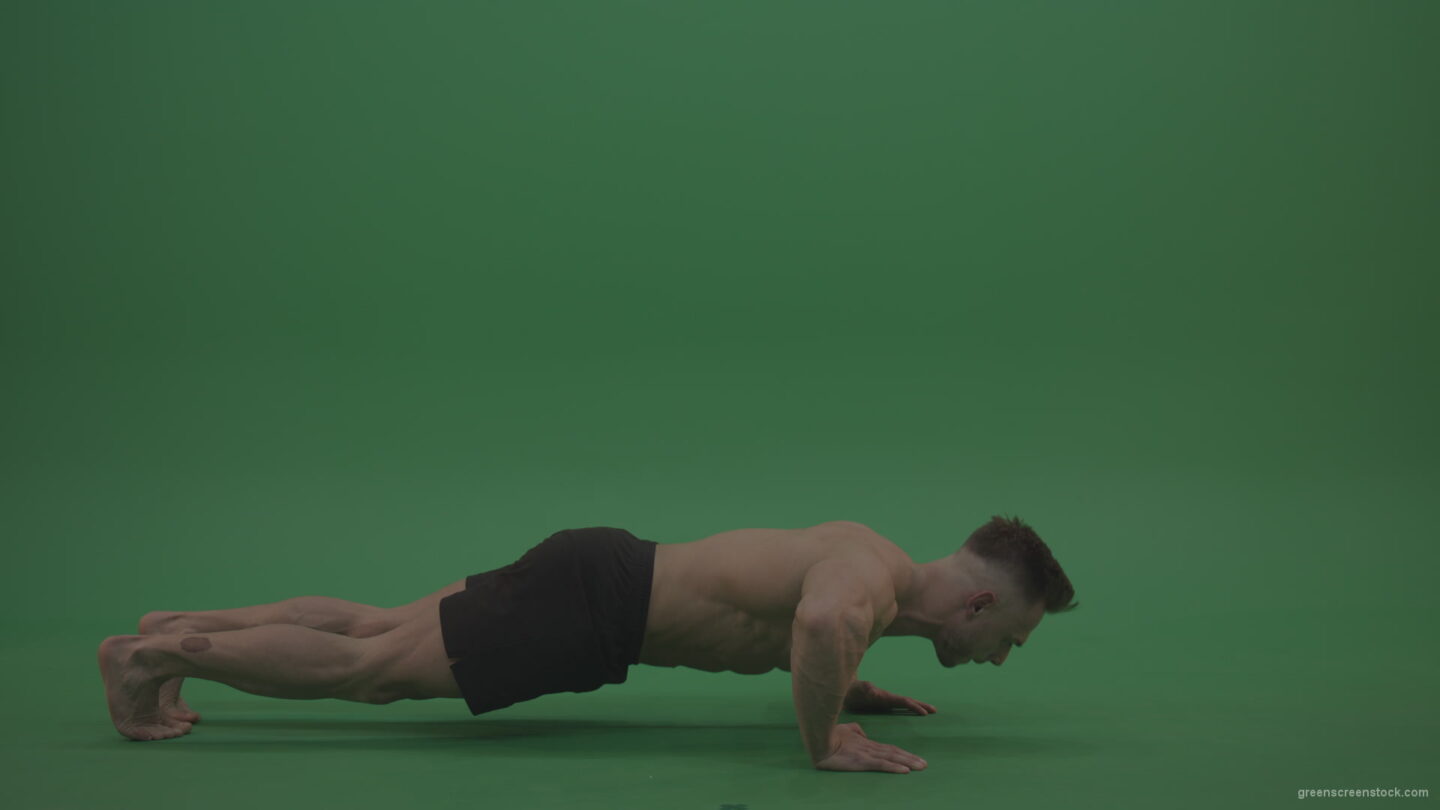 vj video background Young_Bodybuilder_Starts_Working_Out_From_Crouching_Terminator_Position_Does_Pull_Ups_Turns_Back_To_The_Start_Position_On_Green_Screen_Wall_Background_003