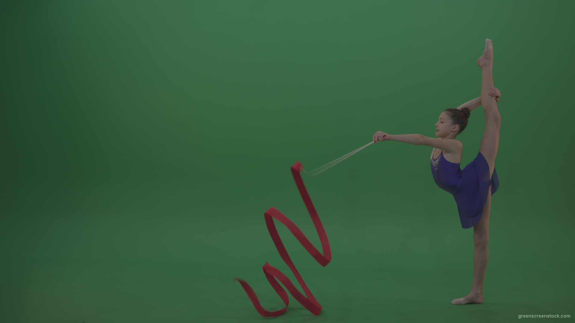 Young_Brunette_Gymnast_Wearing_Blue_Sparkling_Costume_Performing_Some_Acro_Dance_Moves_And_Positions_Using_Ribbon_On_Green_Screen_Chroma_Key_Wall_Background_004 Green Screen Stock