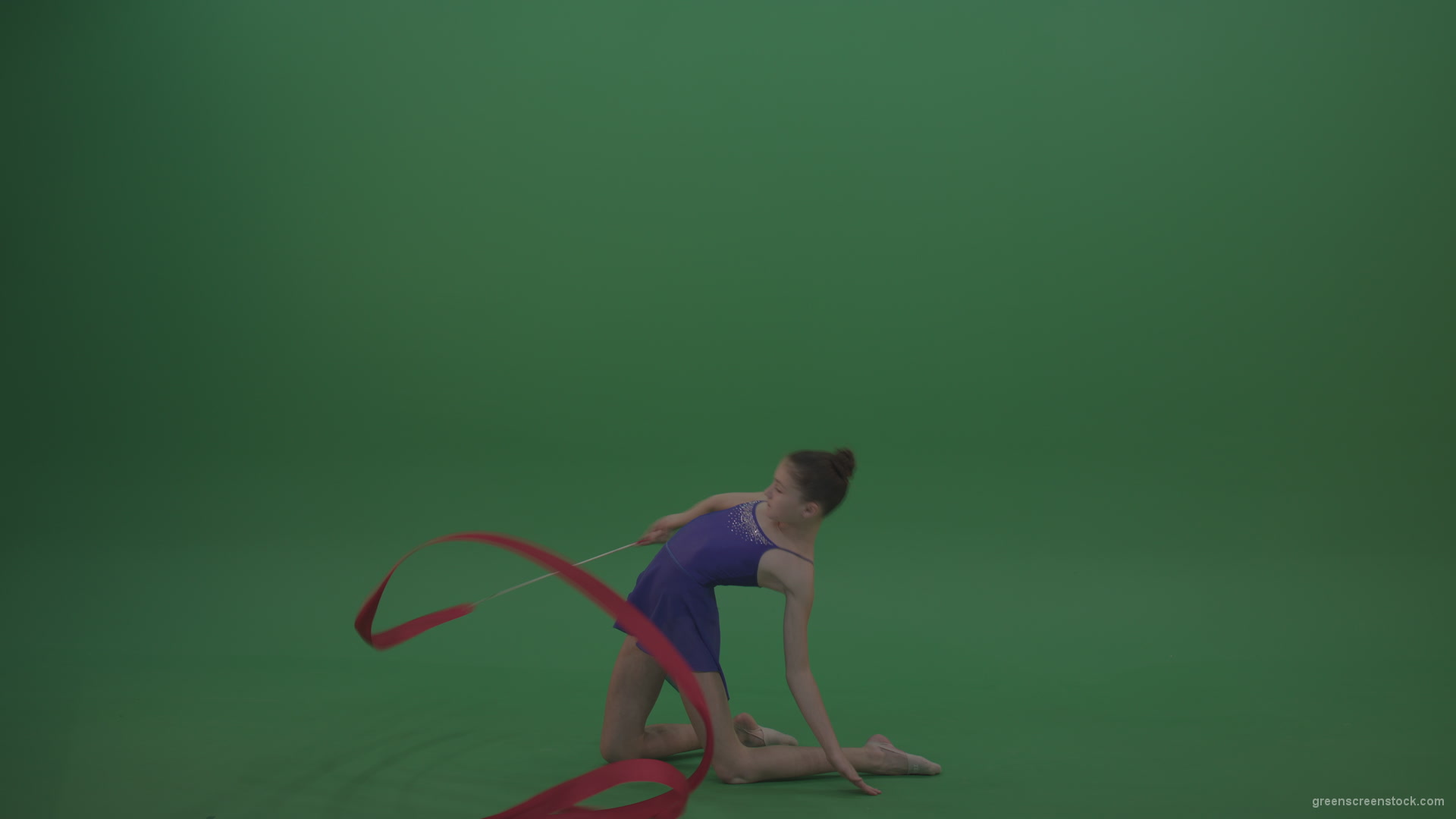 Young_Brunette_Gymnast_Wearing_Blue_Sparkling_Costume_Performing_Some_Acro_Dance_Moves_And_Positions_Using_Ribbon_On_Green_Screen_Chroma_Key_Wall_Background_007 Green Screen Stock