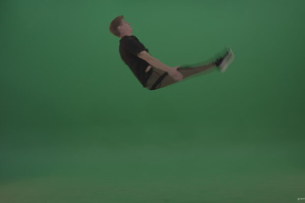 Young_Dangerous_Redhead_Boy_Doing_Icredible_Wheel_And_Back_Flip_Freerun_Parkour_Moves_On_Green_Screen_Wall_Background_007 Green Screen Stock