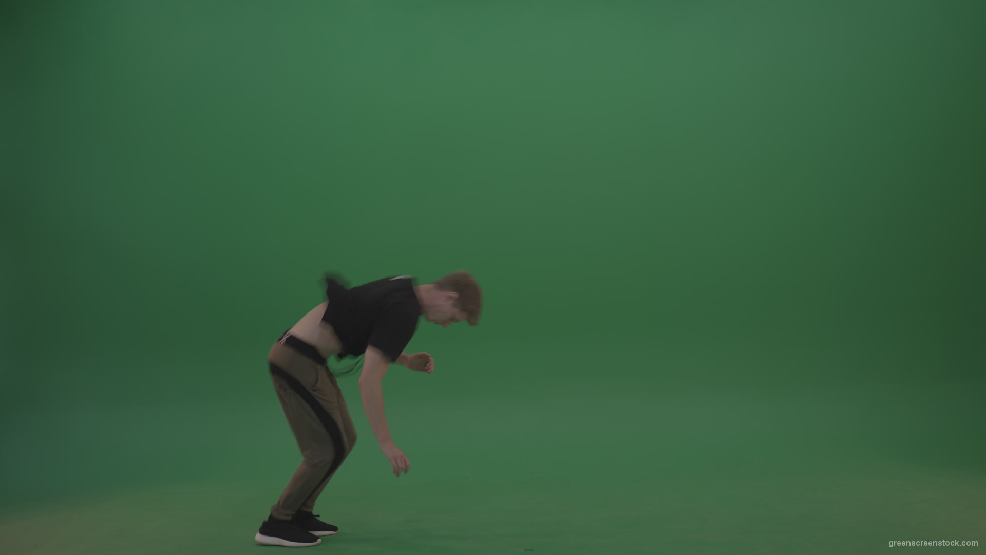 Young_Dangerous_Redhead_Boy_Doing_Icredible_Wheel_And_Back_Flip_Freerun_Parkour_Moves_On_Green_Screen_Wall_Background_008 Green Screen Stock