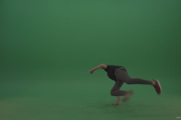Young_Dark_Hair_Boy_Does_Perfect_Scoot_Back_360_Freerun_Parkour_Trick_On_Green_Screen_Wall_Background_006 Green Screen Stock