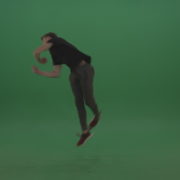 Young_Dark_Hair_Boy_Does_Perfect_Scoot_Back_360_Freerun_Parkour_Trick_On_Green_Screen_Wall_Background_007 Green Screen Stock