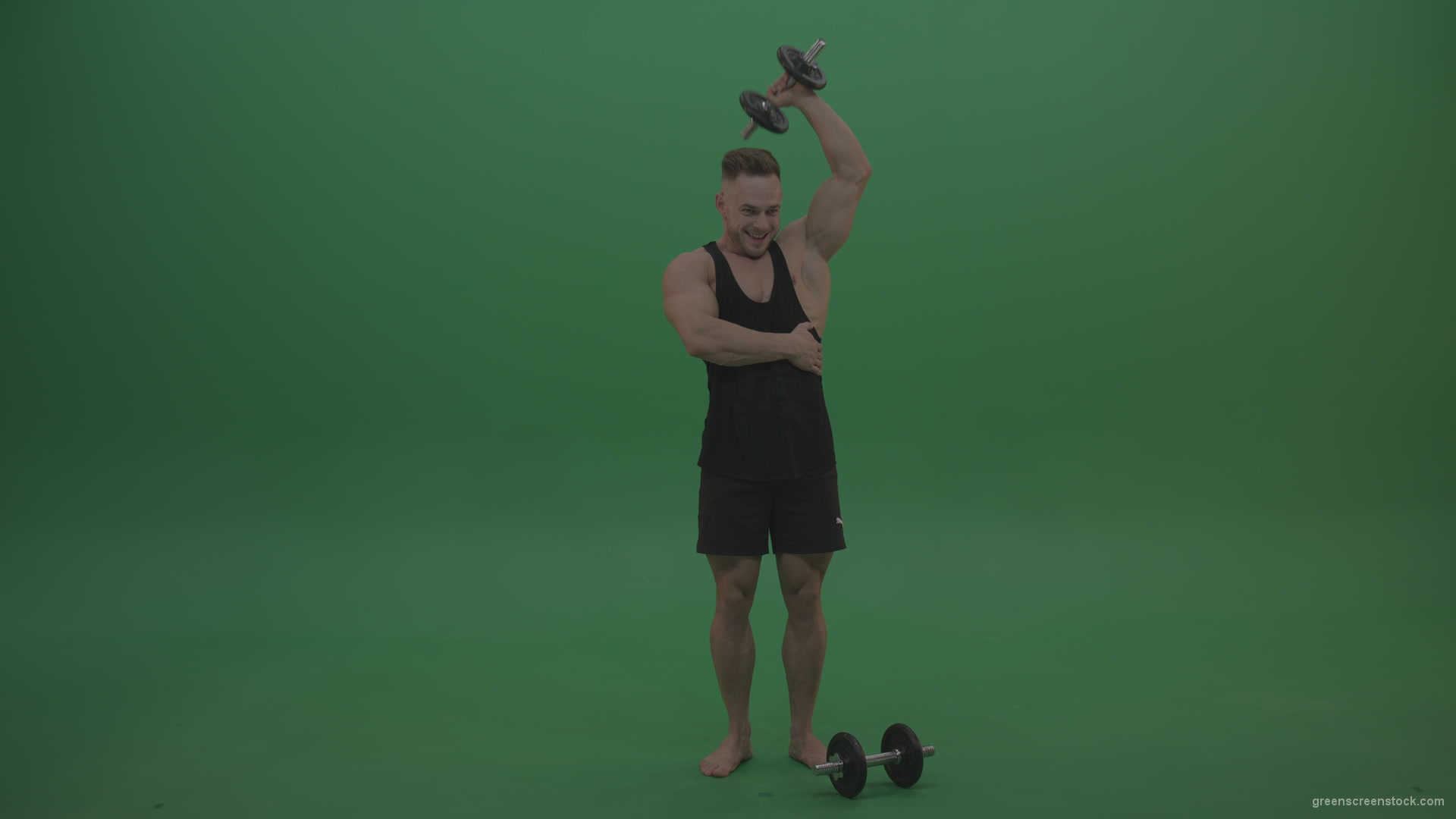 vj video background Young_Handsome_Bodybuilder_Warming_Up_Deltoid_Muscles_Work_Out_Dumbbell_Pull_Ups_On_Green_Screen_Chroma_Key_Wall_Background_003