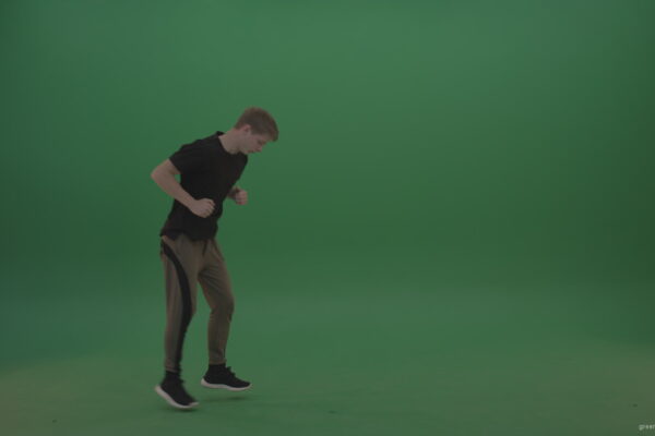 Young_Male_With_Red_Hair_Doing_Perfect_Roundoff_Back_Flip_Freerun_Parkour_Movement_Trick_On_Green_Screen_Wall_Background_008 Green Screen Stock