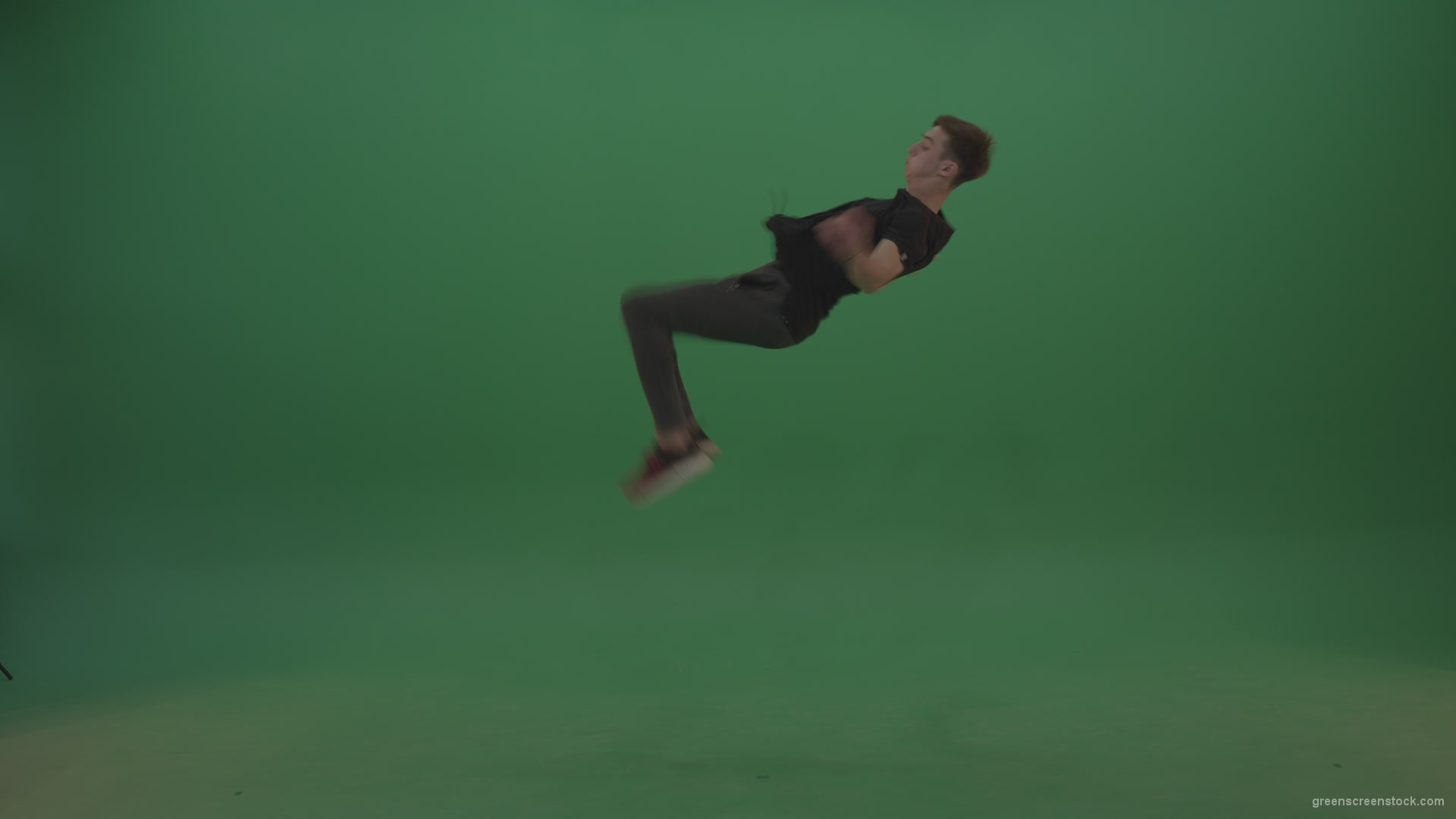 Young_Sporty_Man_Doing_Excellent_Awesome_Back_Flip_On_Green_Screen_Wall_Background_006 Green Screen Stock