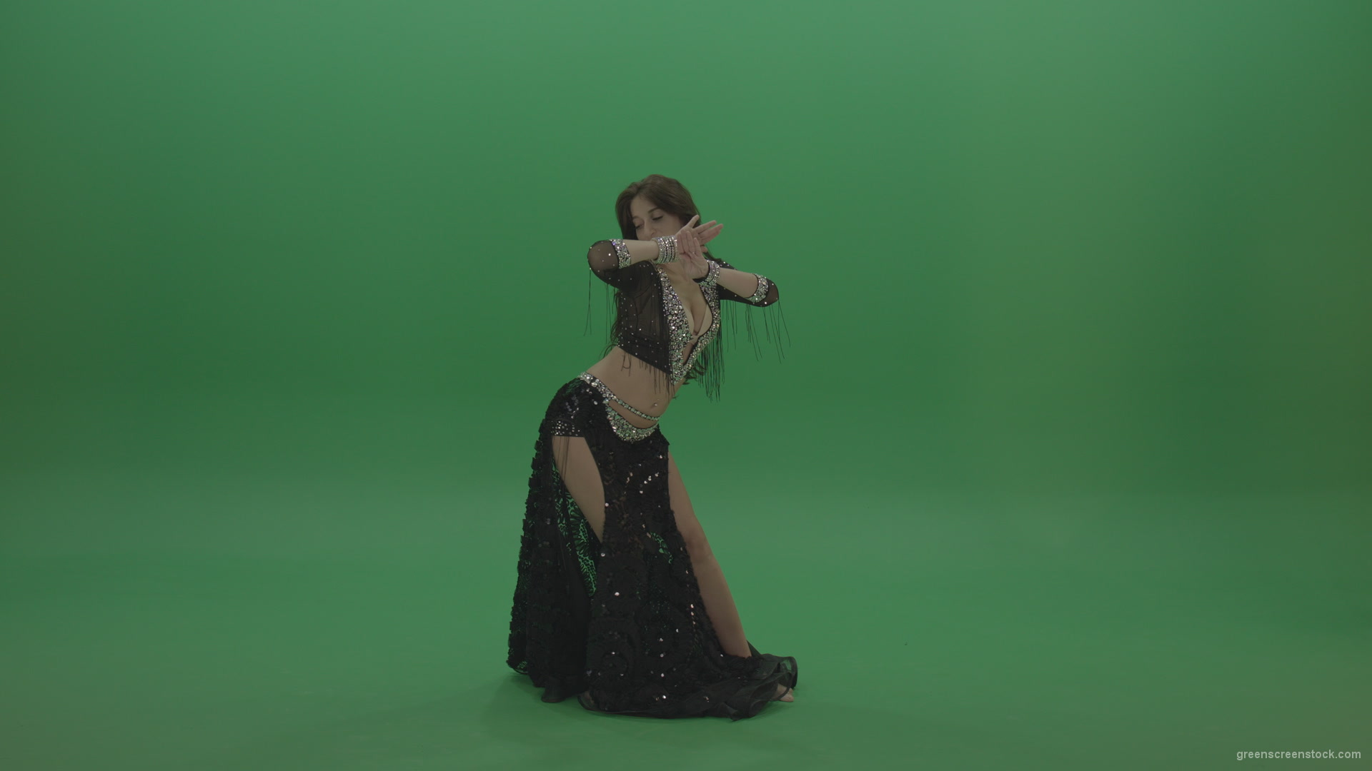 vj video background Admirable-belly-dancer-in-black-wear-display-amazing-dance-moves-over-chromakey-background_003