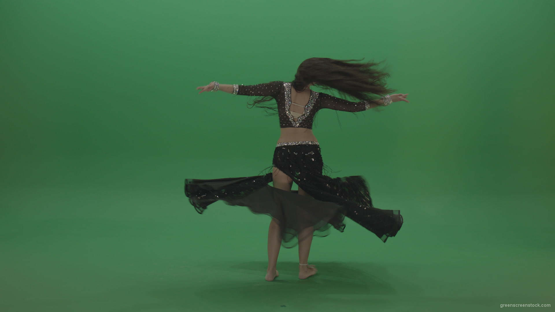 Appealing-belly-dancer-in-black-wear-display-amazing-dance-moves-over-chromakey-background_005 Green Screen Stock