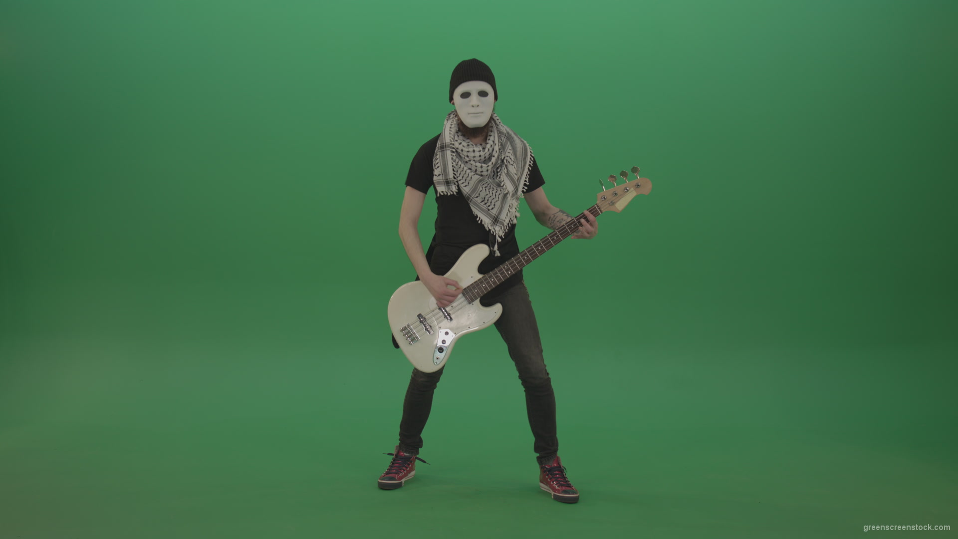 Bass-guitaris-in-full-size-play-white-guitar-in-white-mask-on-chromakey-green-screen_006 Green Screen Stock