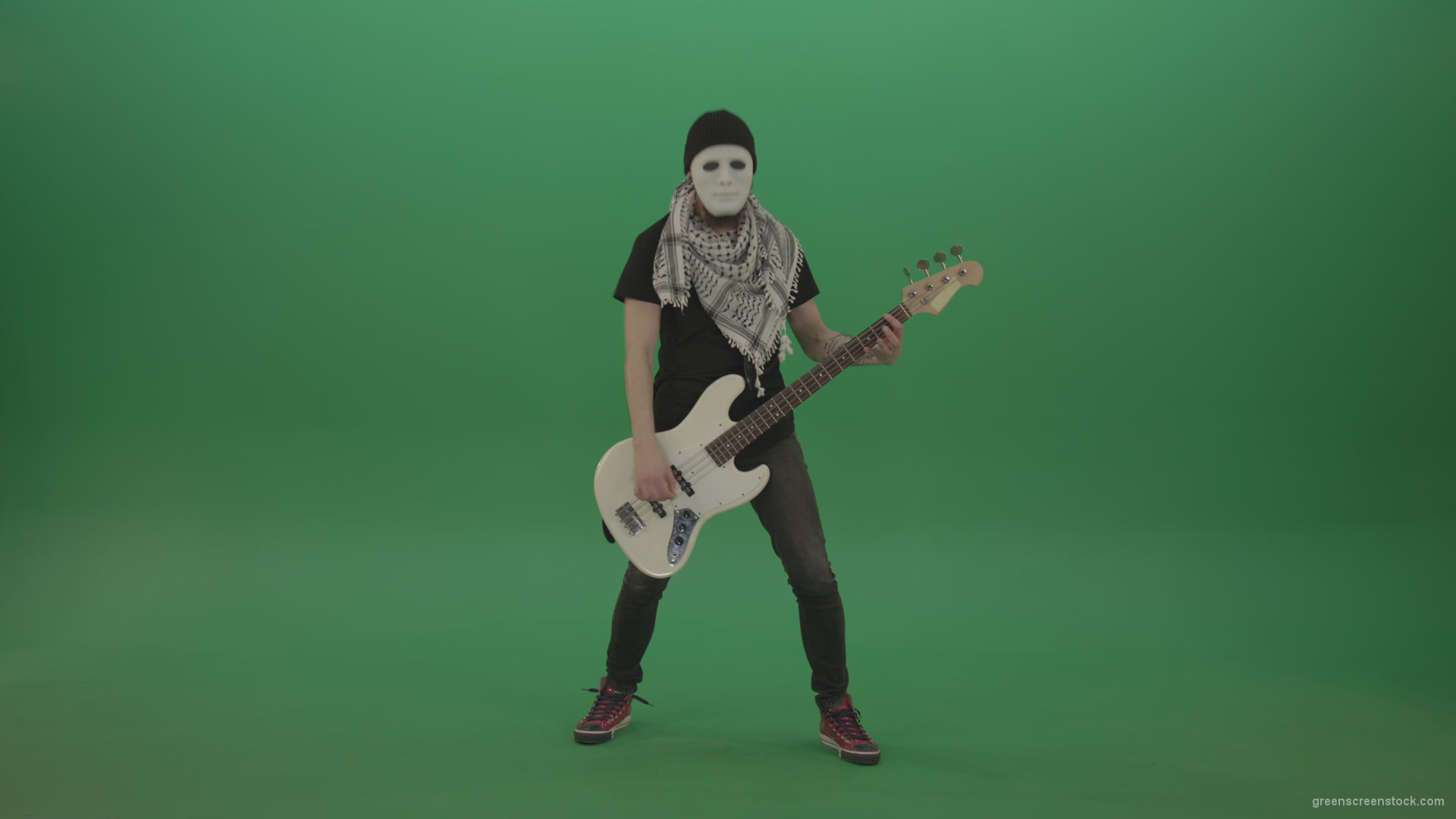 Bass-guitaris-in-full-size-play-white-guitar-in-white-mask-on-chromakey-green-screen_007 Green Screen Stock
