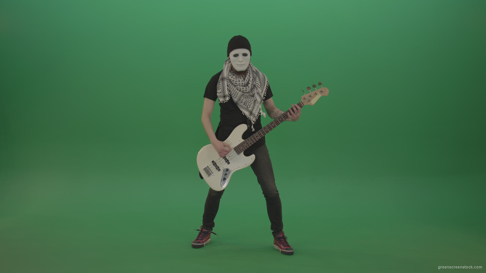 Bass-guitaris-in-full-size-play-white-guitar-in-white-mask-on-chromakey-green-screen_008 Green Screen Stock