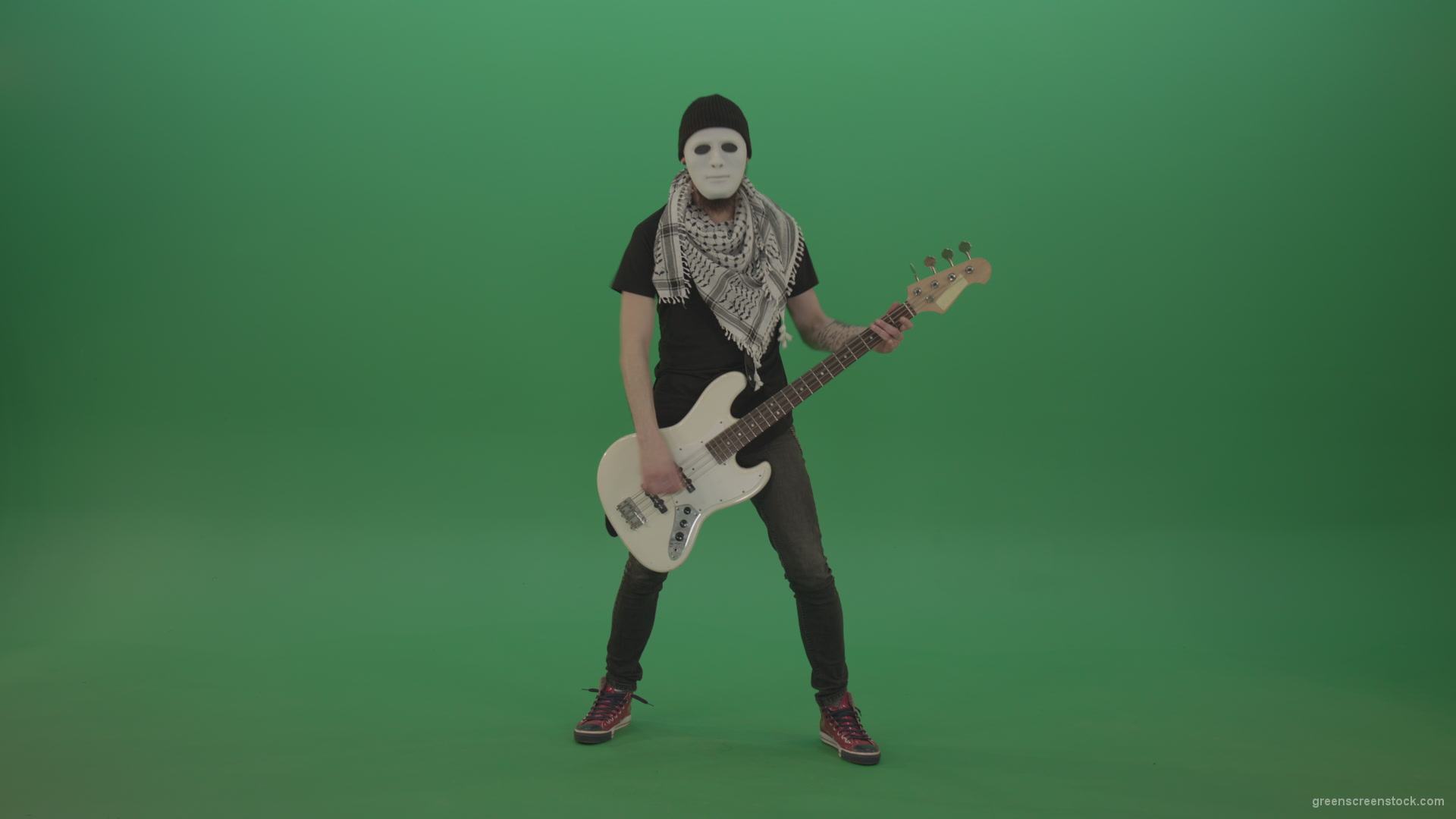 Bass-guitaris-in-full-size-play-white-guitar-in-white-mask-on-chromakey-green-screen_009 Green Screen Stock