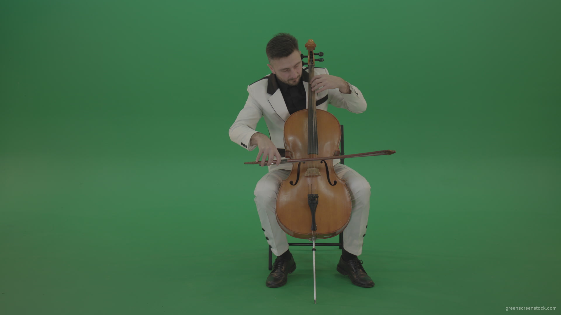 Classic-orchestra-man-in-white-wear-play-violoncello-cello-strings-music-instrument-isolated-on-green-screen_001 Green Screen Stock
