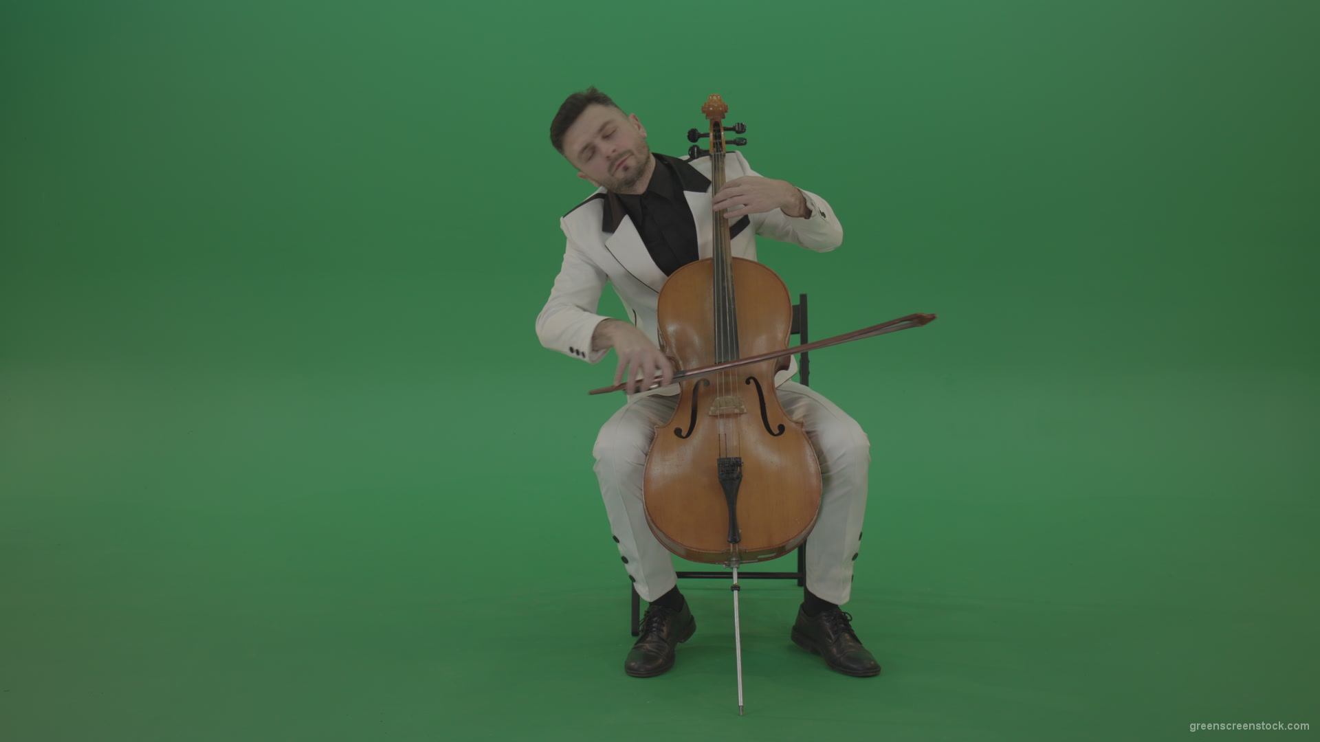 Classic-orchestra-man-in-white-wear-play-violoncello-cello-strings-music-instrument-isolated-on-green-screen_002 Green Screen Stock
